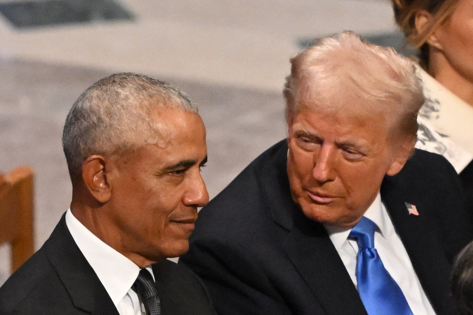 US president-elect Donald Trump speaks with former president Barack Obama as they attend Jimmy Carter’s state funeral at the Washington National Cathedral on Thursday. Photo: AFP