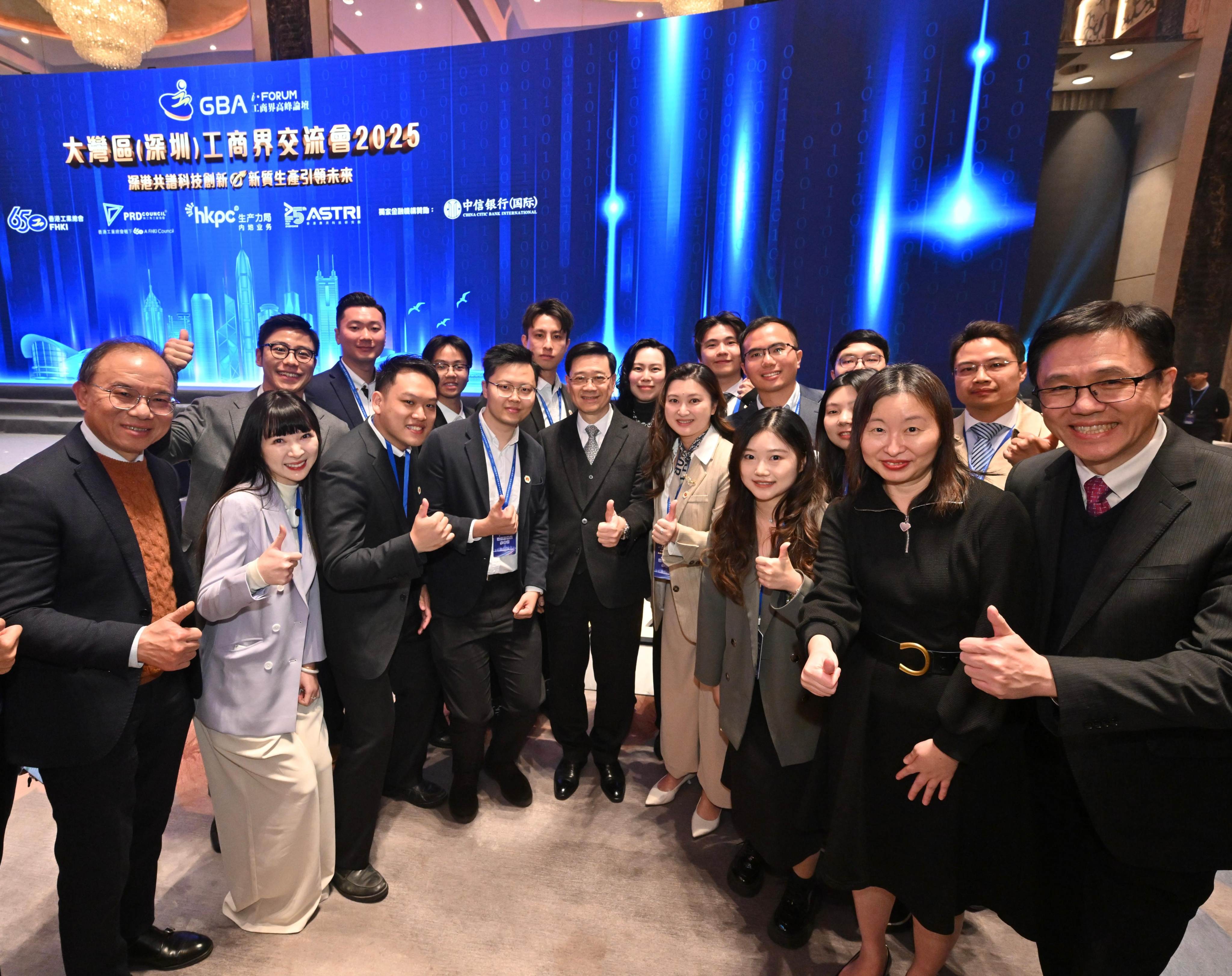 Hong Kong Chief Executive John Lee (centre), Secretary for Constitutional and Mainland Affairs Erick Tsang Kwok-wai (left) and  Secretary for Innovation, Technology and Industry Sun Dong (right) at the summit. Photo: Handout