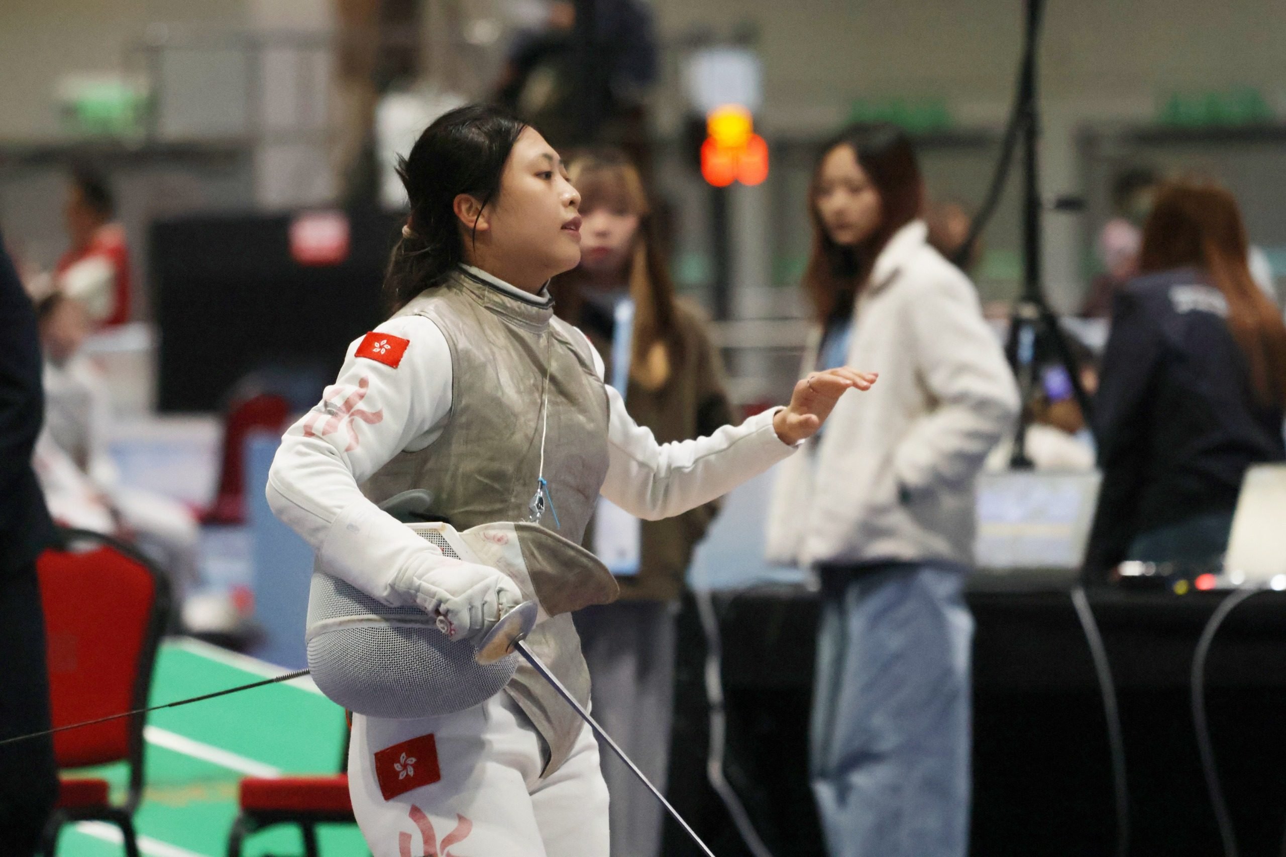 Kuan Yu-ching sustained a reoccurrence of the injury in her left knee during the preliminary rounds of the event. Photo: Mike Chan