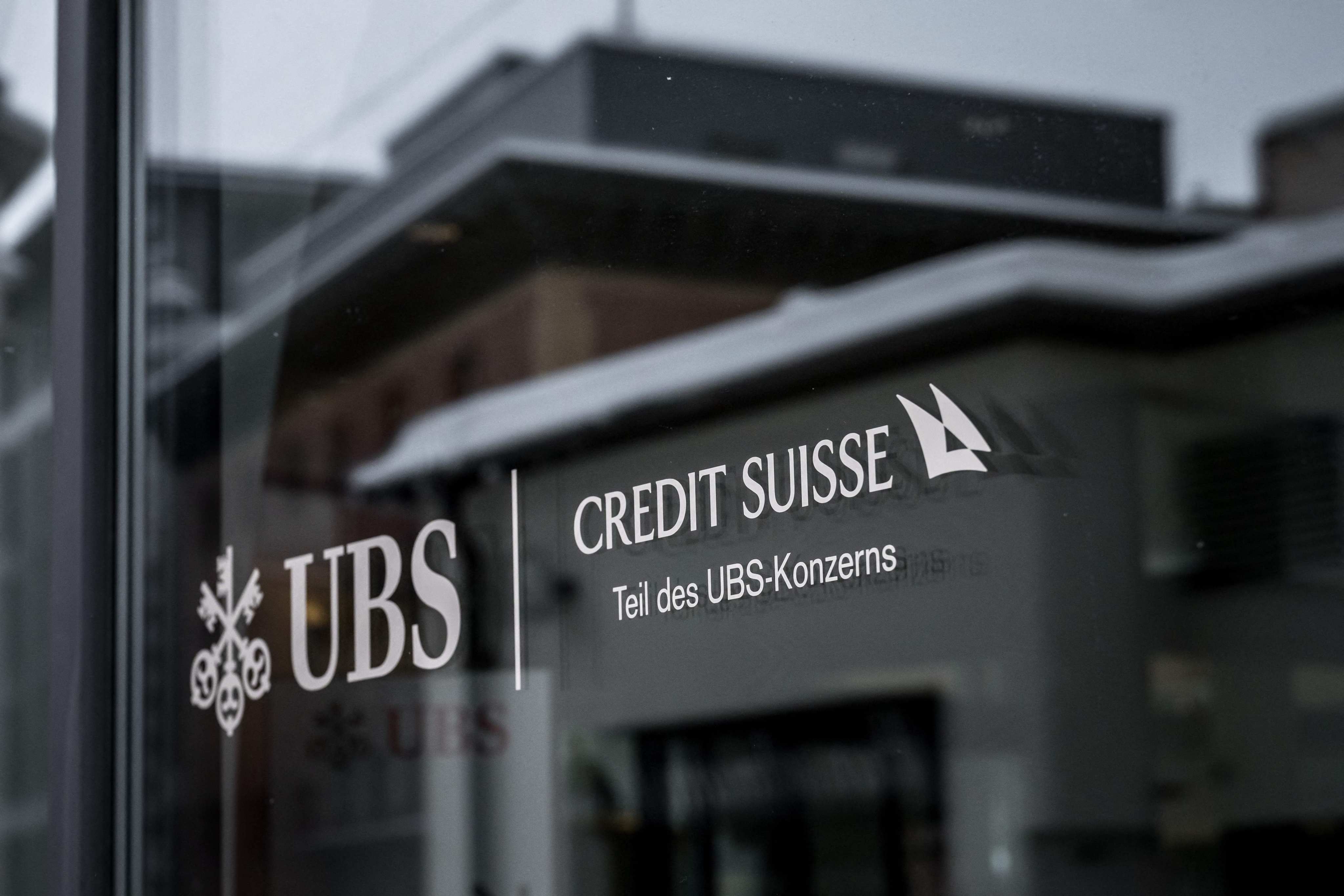 A UBS/Credit Suisse sign in St. Moritz, Switzerland. Photo: AFP