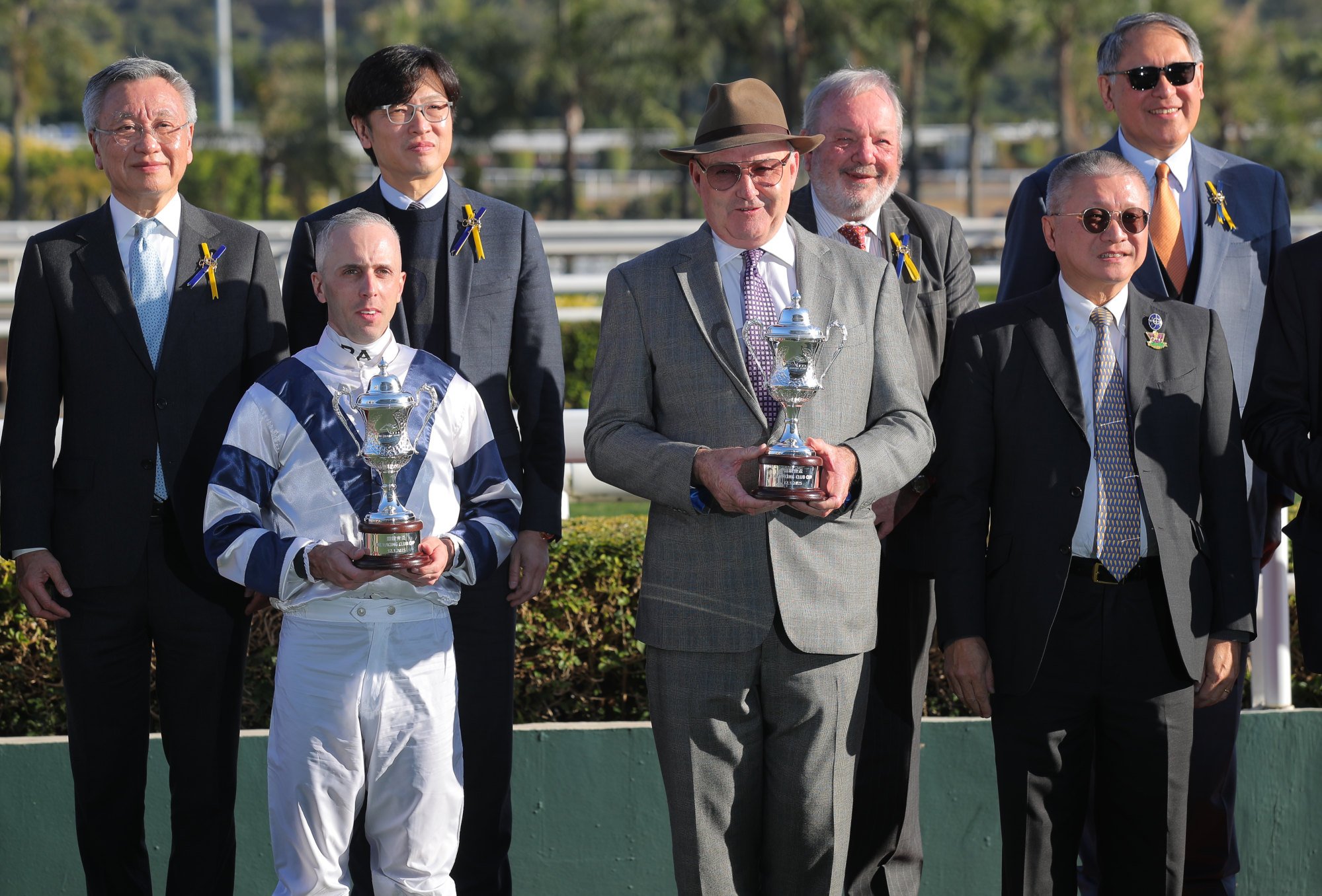 Jockey Brenton Avdulla and trainer David Hayes with their The Racing Club Cup trophies.