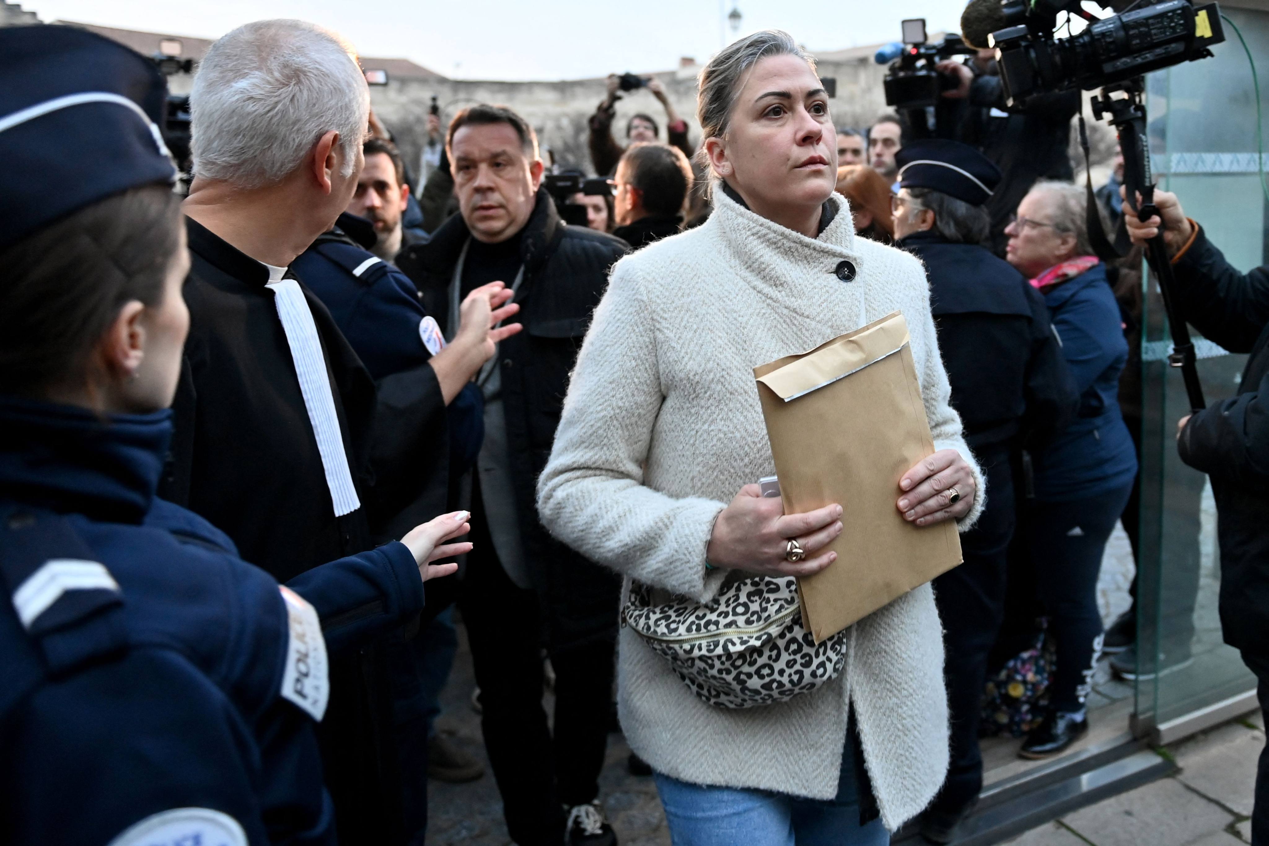 Caroline Darian (centre) arrives at the courthouse in Avignon in December. Photo: AFP