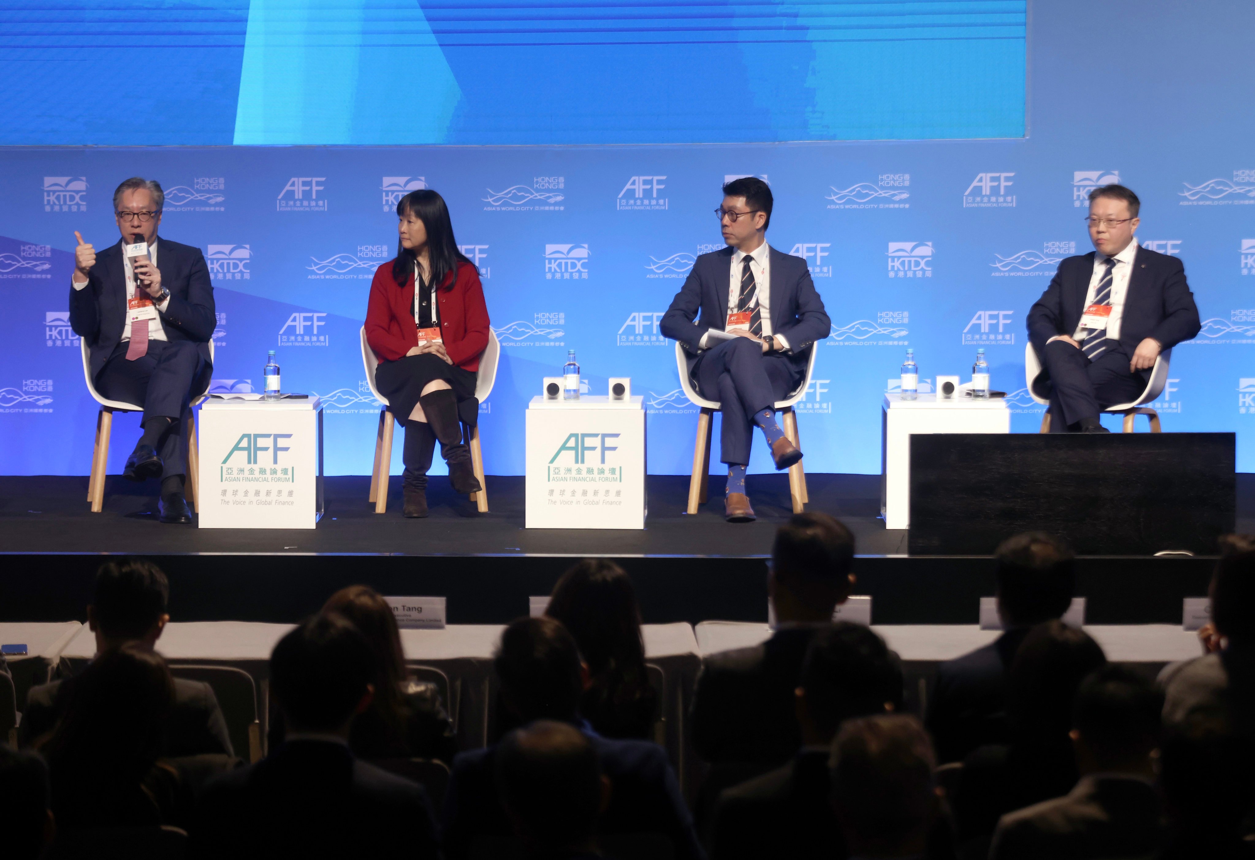 A panel discussion at the Asian Financial Forum with, from left to right, Prudential Hong Kong CEO Lawrence Lam, General Re’s Orchis Li, HKU’s director of the Asia Global Institute Tang Heiwei and Wilson Tang of BOC Group Life Assurance. Photo: Jonathan Wong 