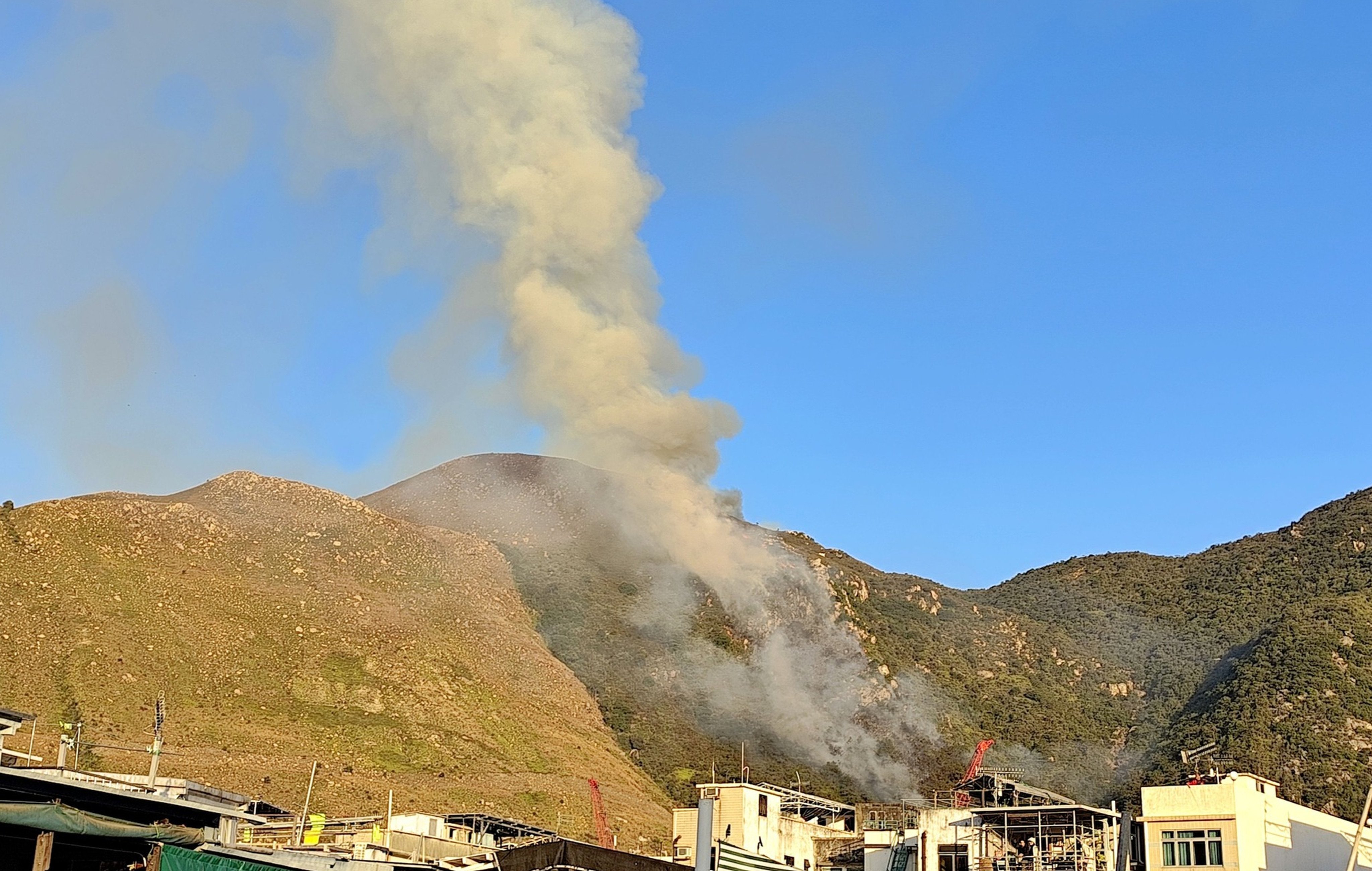 A hill fire on Hong Kong’s Lantau Island is still burning after 17 hours. Photo: Facebook