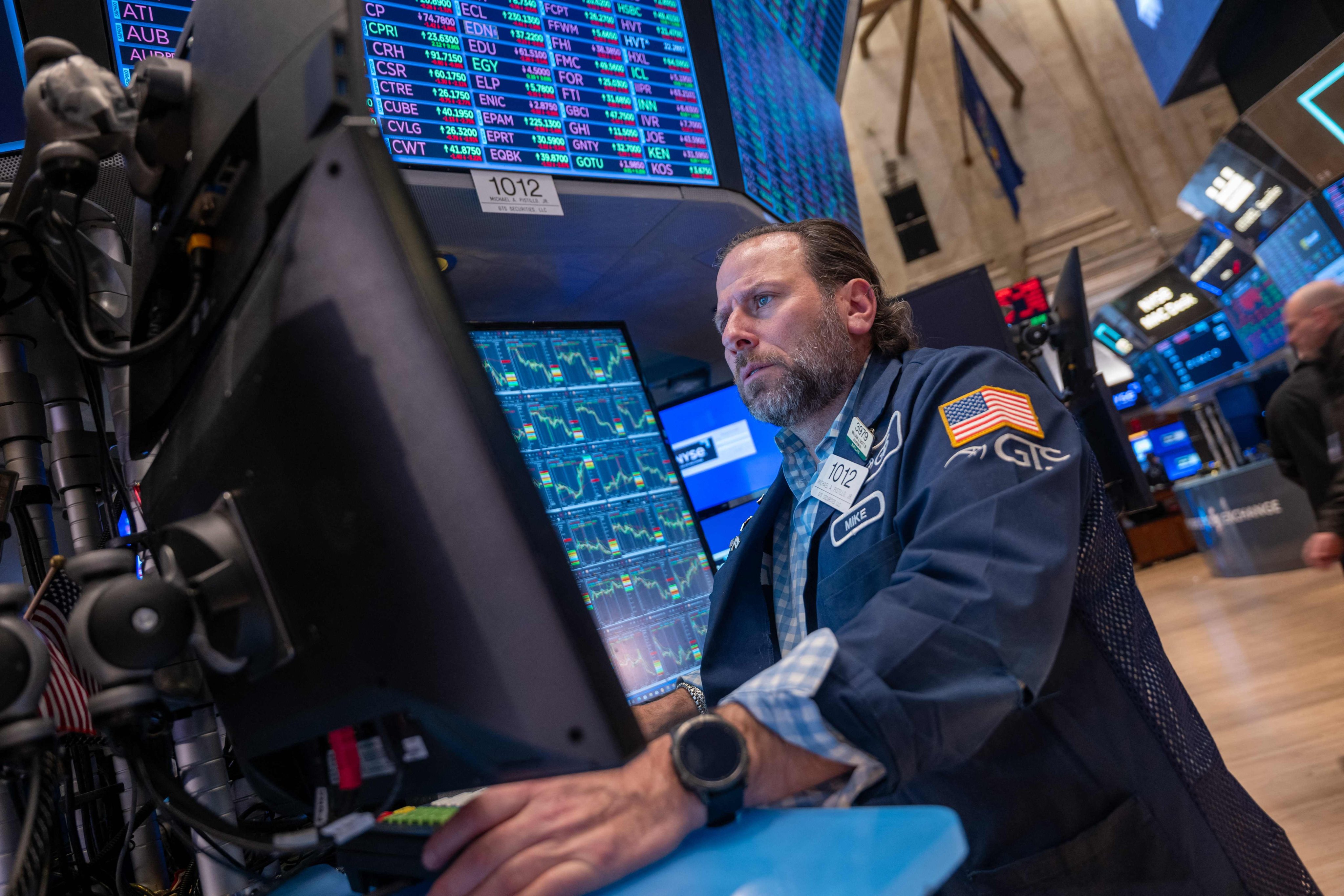 A trader works on the floor of the New York Stock Exchange on January 10, 2025 in New York City. The Dow fell over 700 points on Friday as markets continued to react to strong US job numbers. Photo: AFP