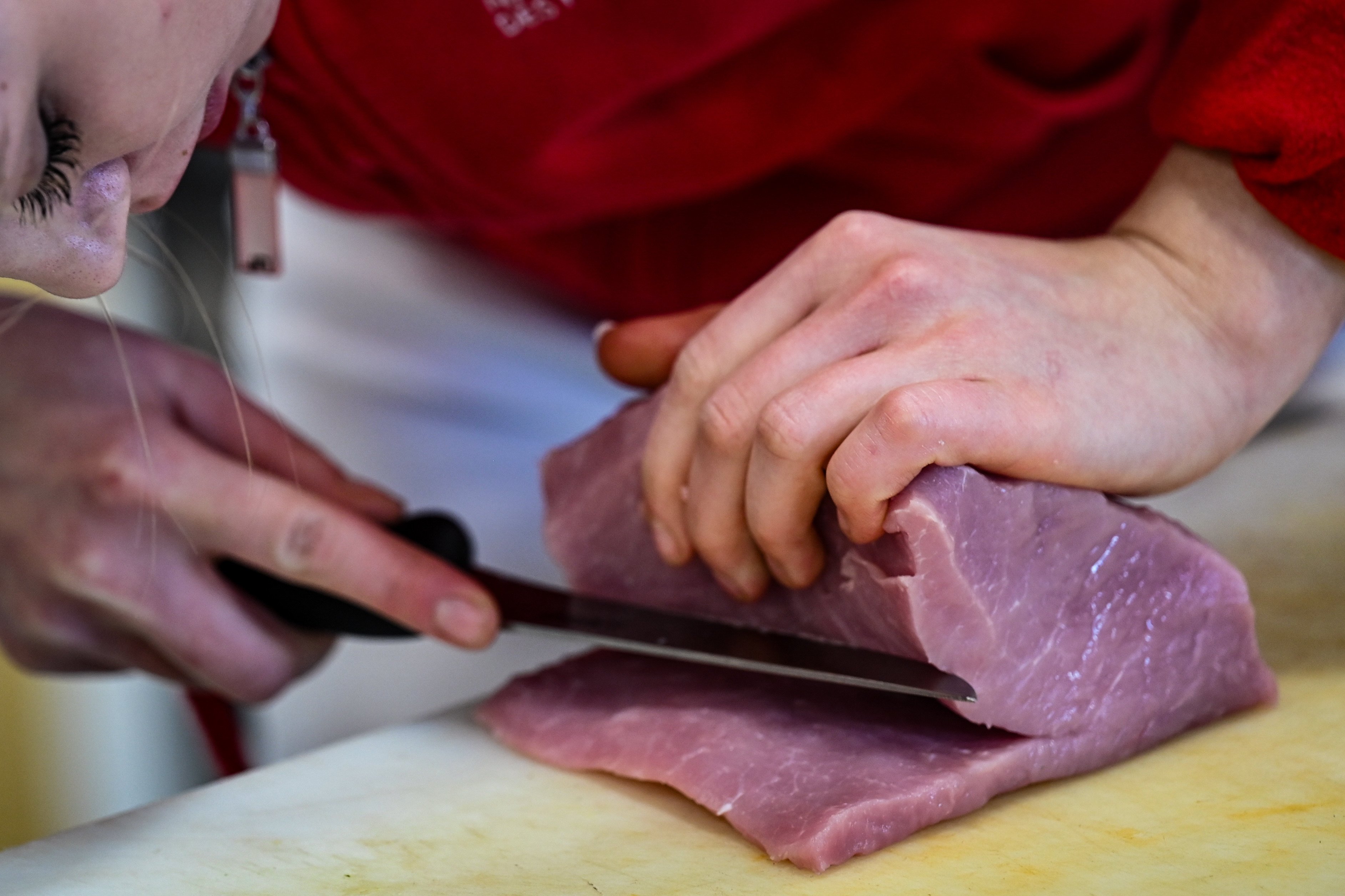 A German butcher prepares pork. South Korea’s Ministry of Agriculture has banned all pork imports from Germany after a recent outbreak of foot-and-mouth disease. Photo: dpa