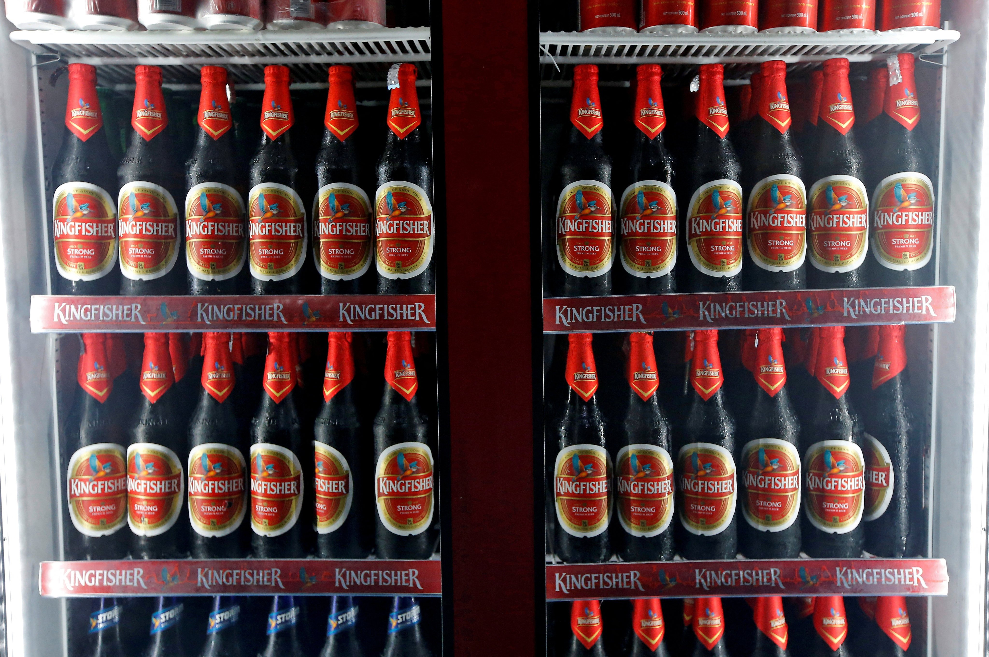 Kingfisher beer bottles are seen for sale at a liquor shop in India. Photo: Reuters