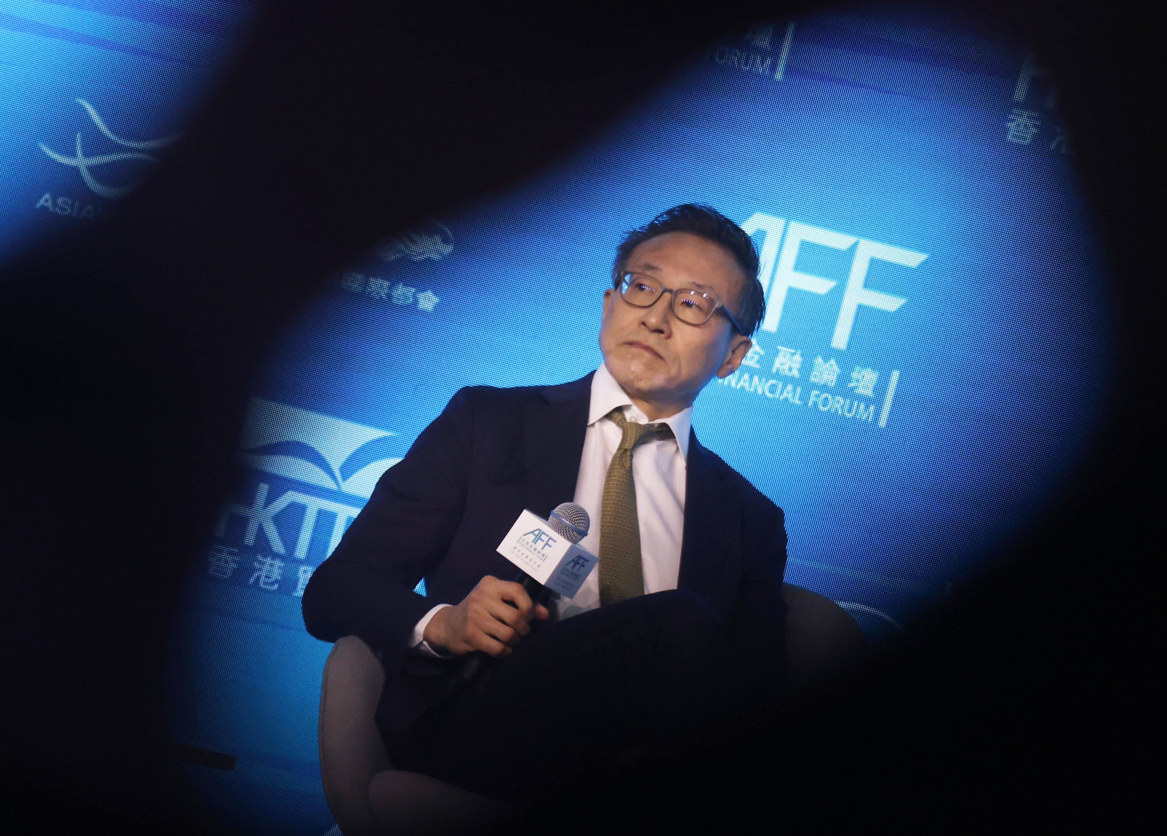 Alibaba Group Holding chairman Joe Tsai speaks at the Asian Financial Forum in Hong Kong on Tuesday. Photo: Jonathan Wong