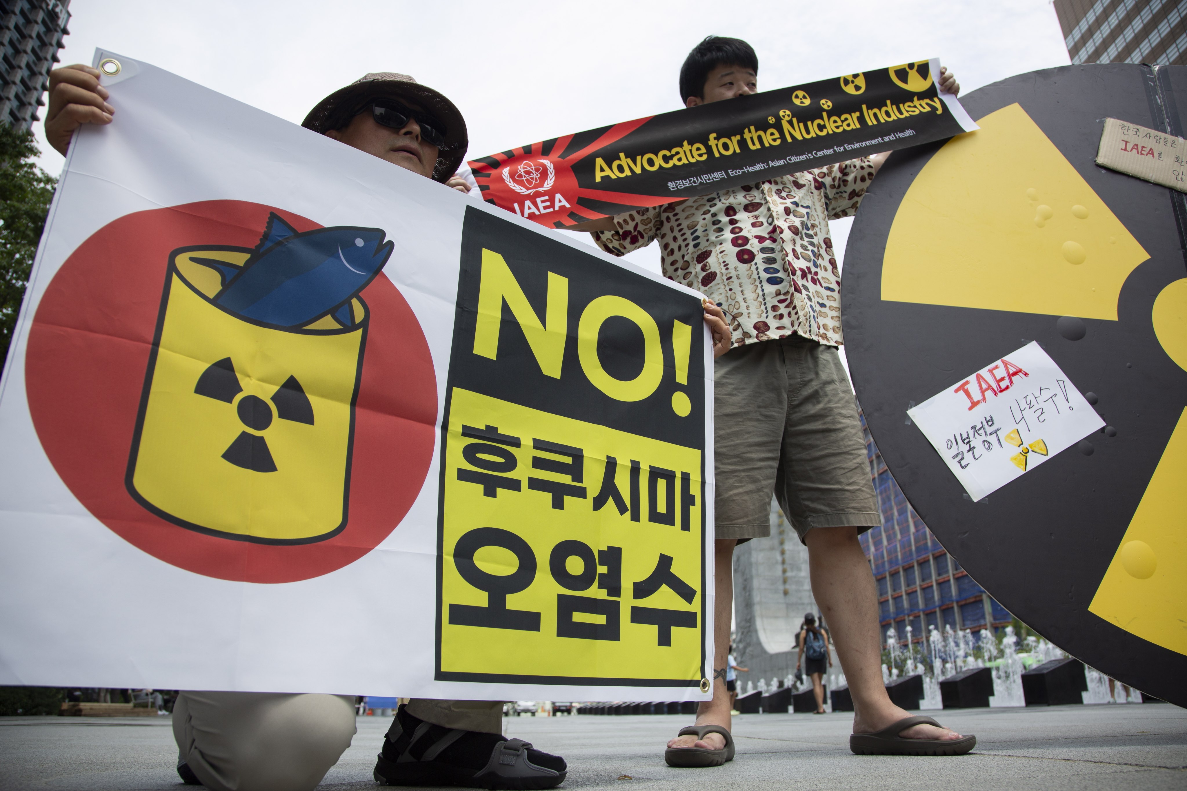 Members of a South Korean environmental group hold banners reading ‘No Fukushima radioactive water’ during a rally in Seoul in 2023. Photo: EPA-EFE