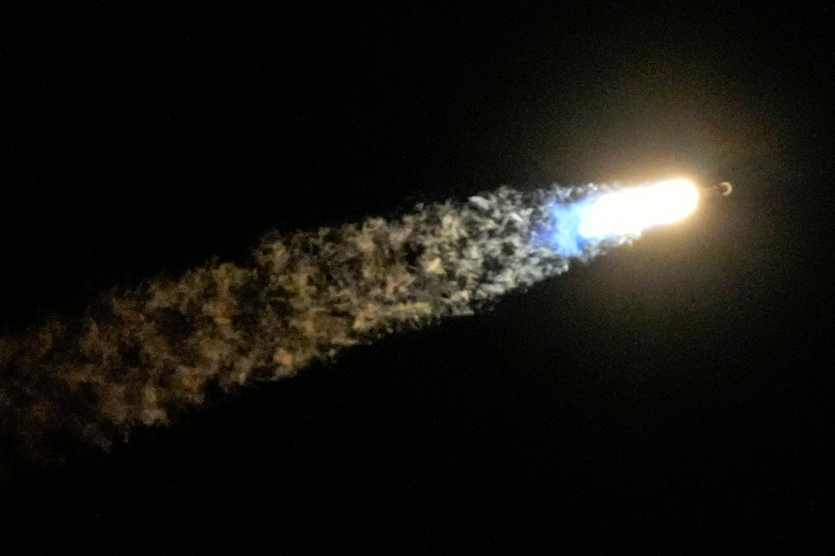 A SpaceX Falcon 9 rocket lifts off on Wednesday. Photo: AP