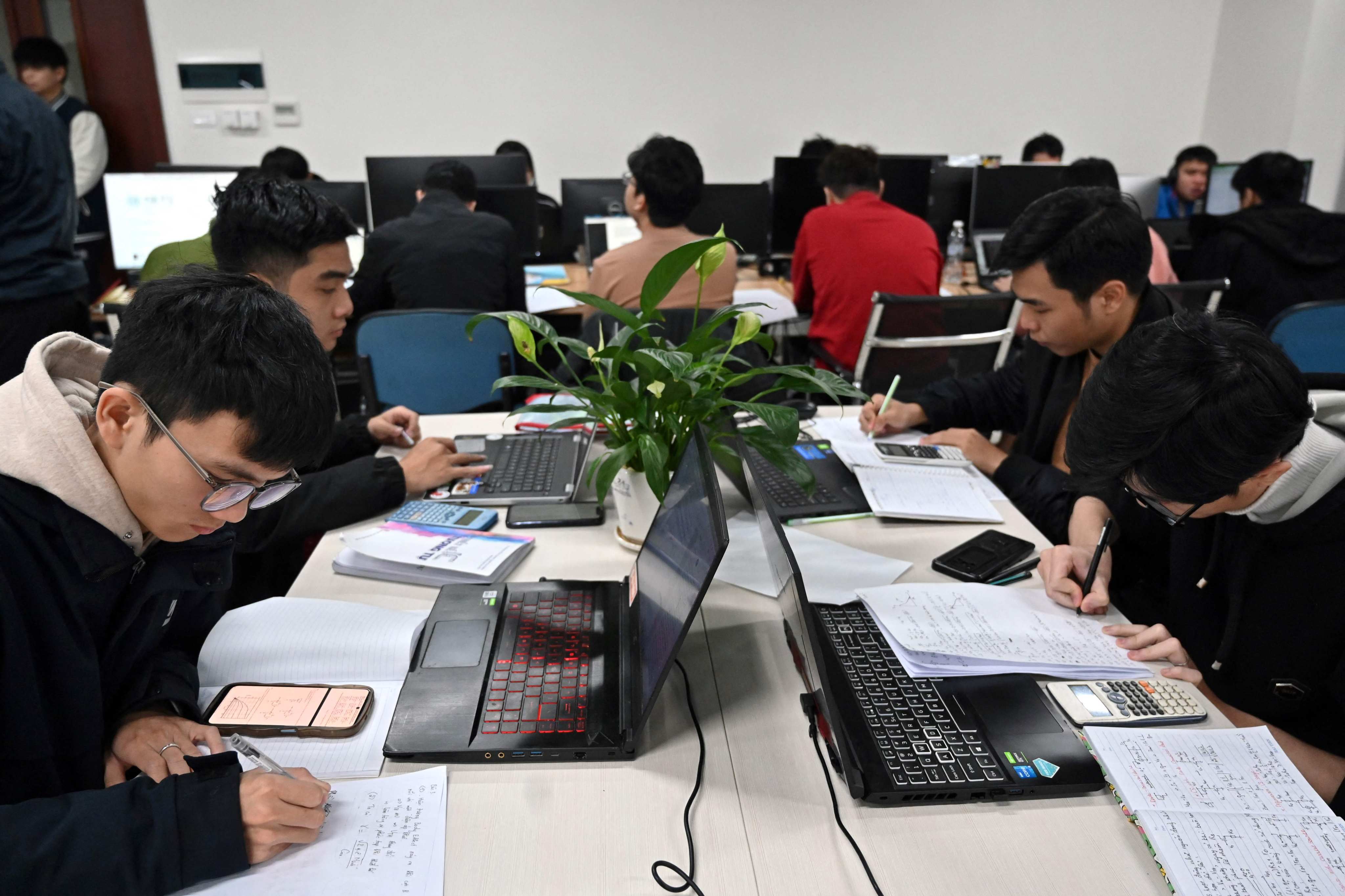 Vietnamese students work in a classroom at the Hanoi University of Science and Technology in Vietnam. Photo: AFP