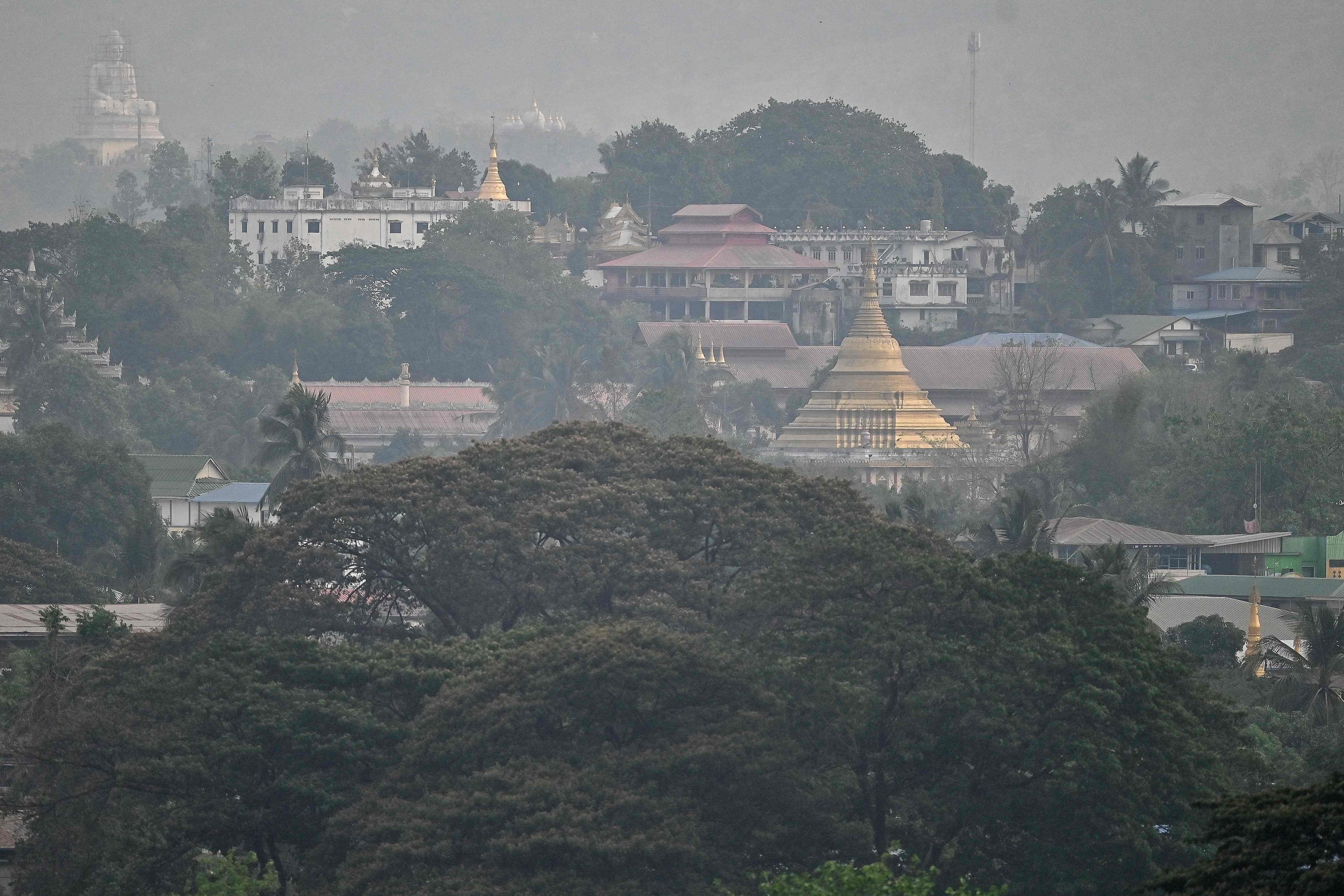 A view of Myanmar’s Myawaddy town seen from Mae Sot district in Thailand. A number of foreigners fled an online scam centre in Myanmar across the border to Thailand last year. Photo: AFP 