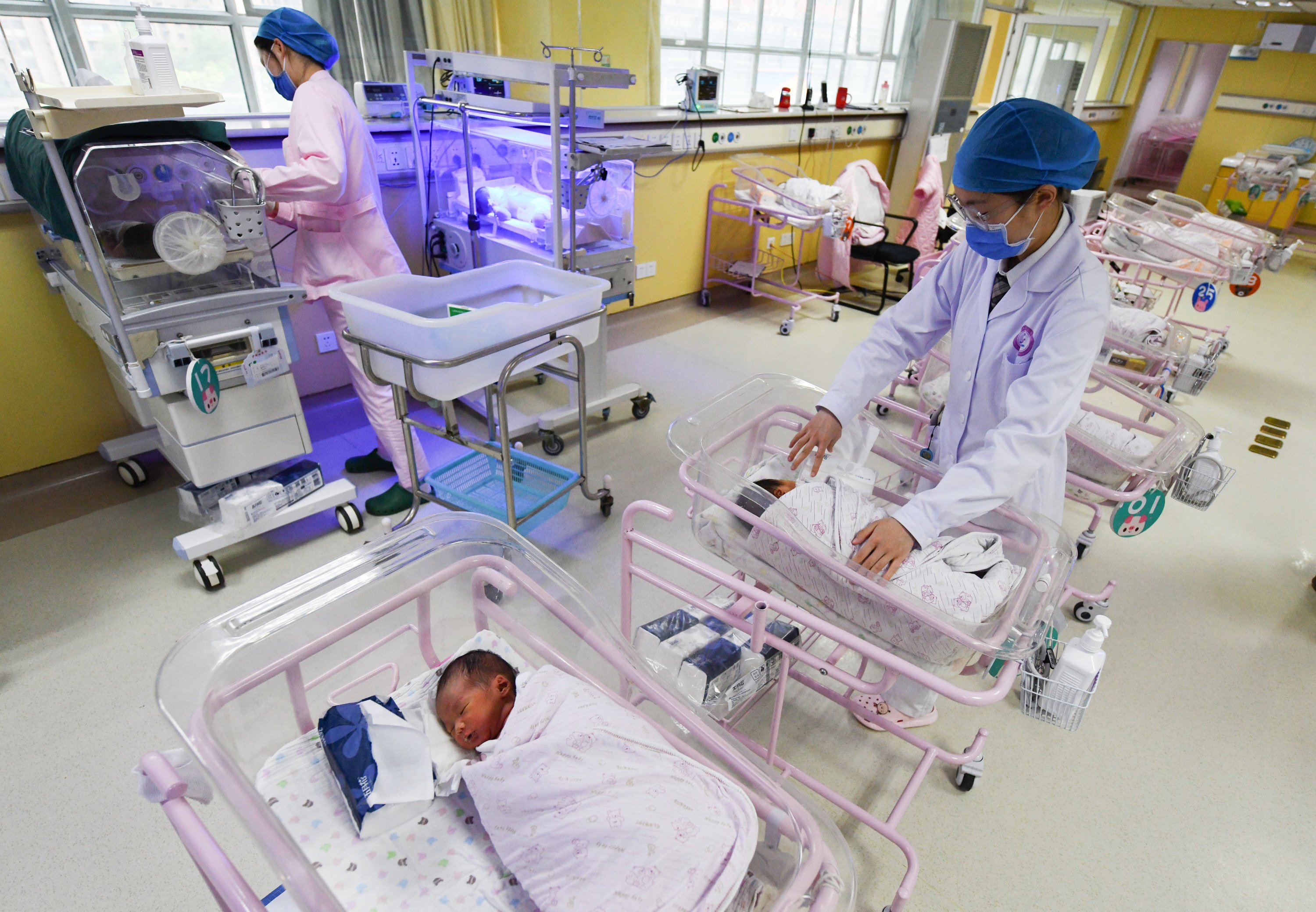 Numerous cities in China are offering incentives to encourage their residents to have more children. Photo: Getty Images