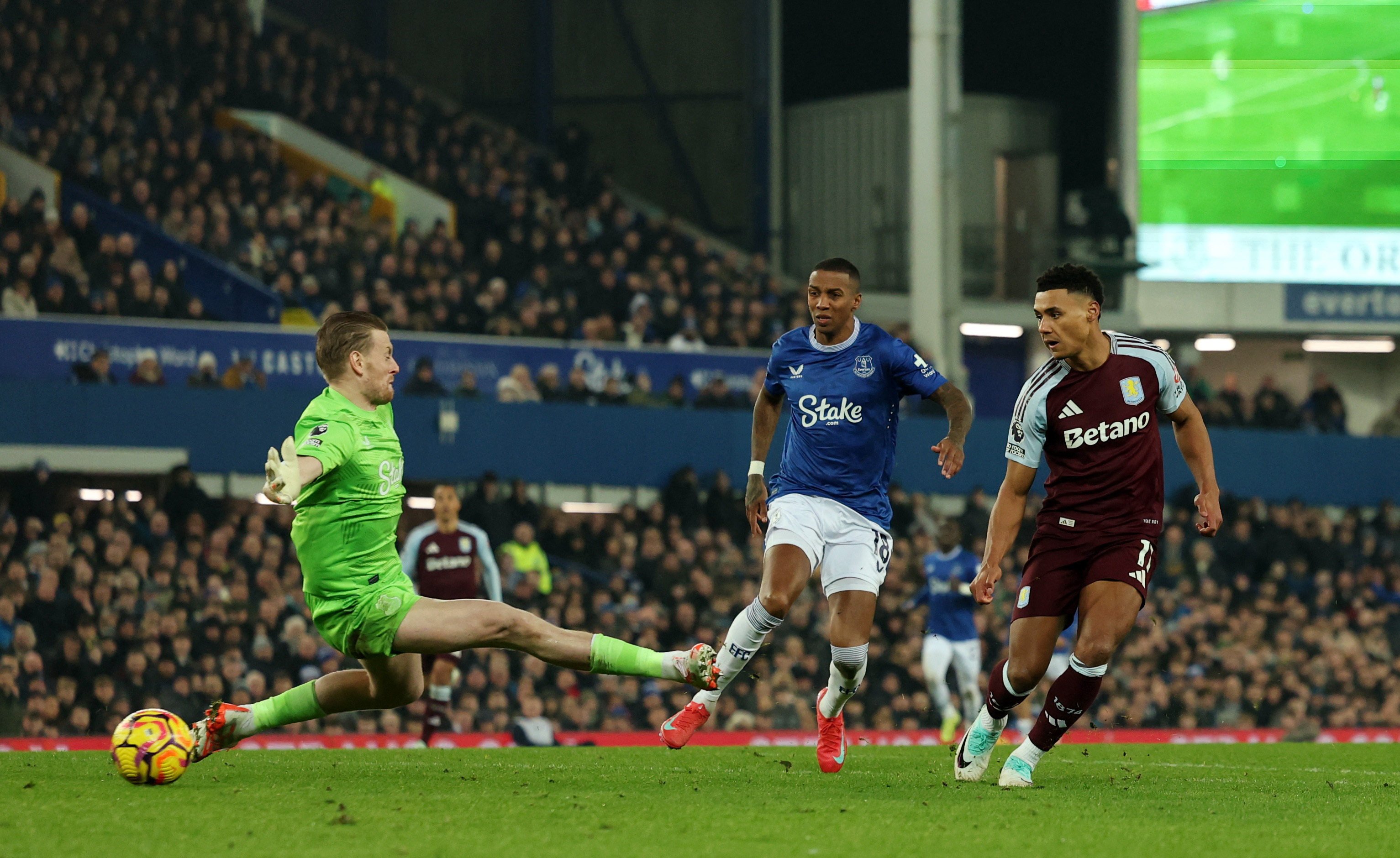 Ollie Watkins fires his decisive second-half strike beyond Everton goalkeeper Jordan Pickford. Photo: Reuters