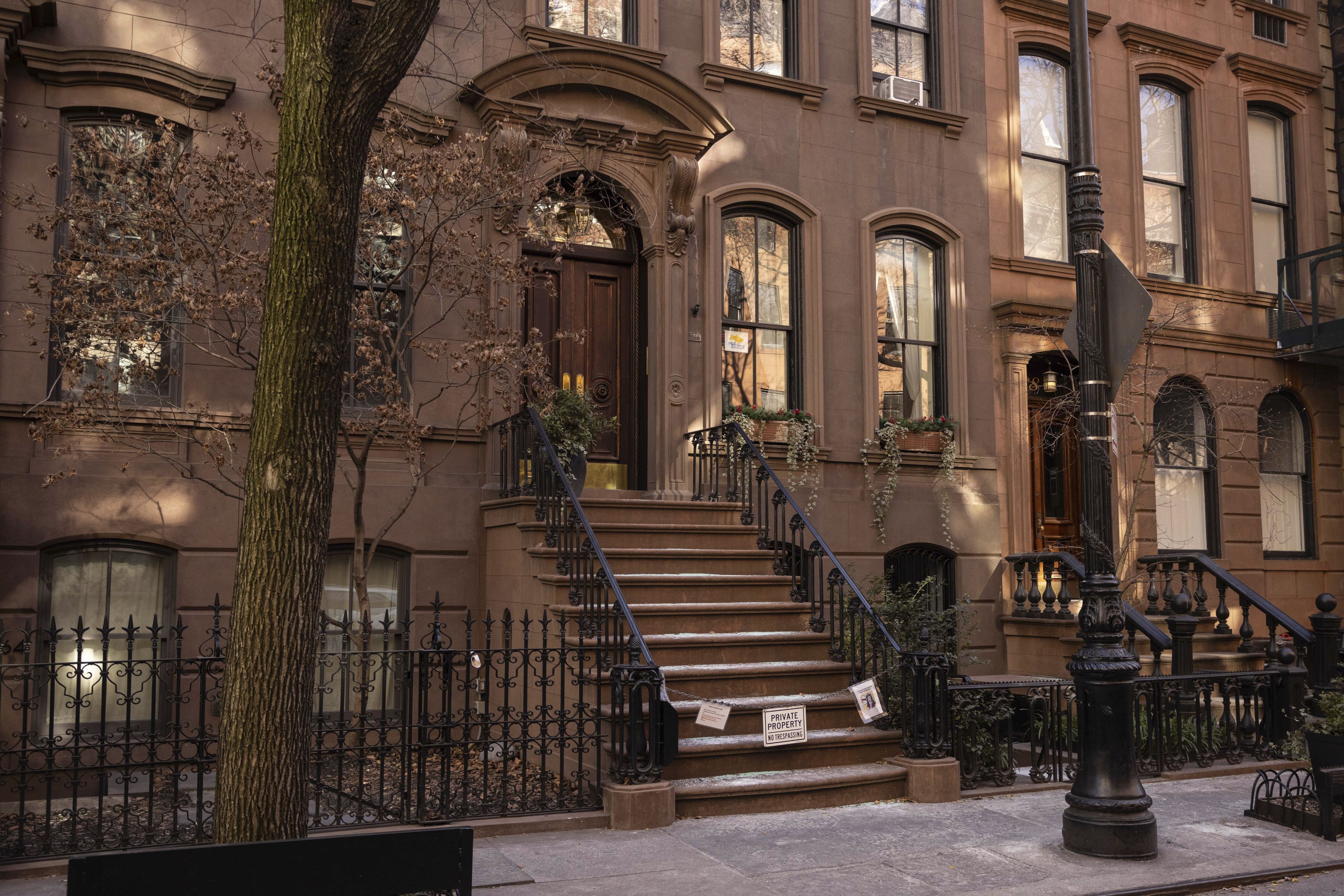 The Manhattan brownstone where Carrie Bradshaw lived in Sex and the City in New York. The city’s Landmarks Preservation Commission approved an application for a metal gate for the front staircase of the house to keep away tourists who endlessly trespass and pose for pictures. Photo: AP