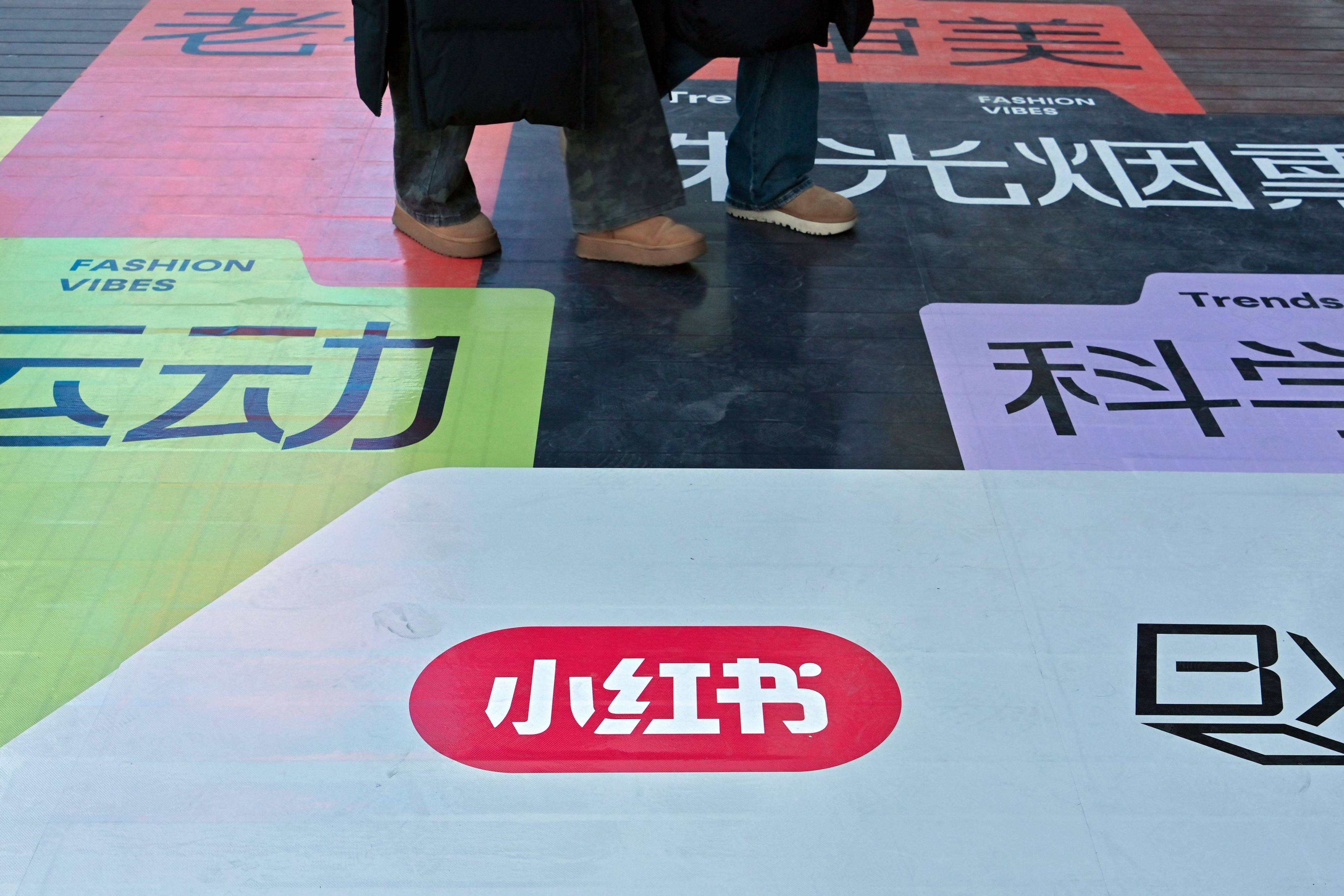 Advertising for Chinese app Xiaohongshu, also known as RedNote, seen on a shopping centre floor in Beijing, January 15, 2025. Photo: AFP