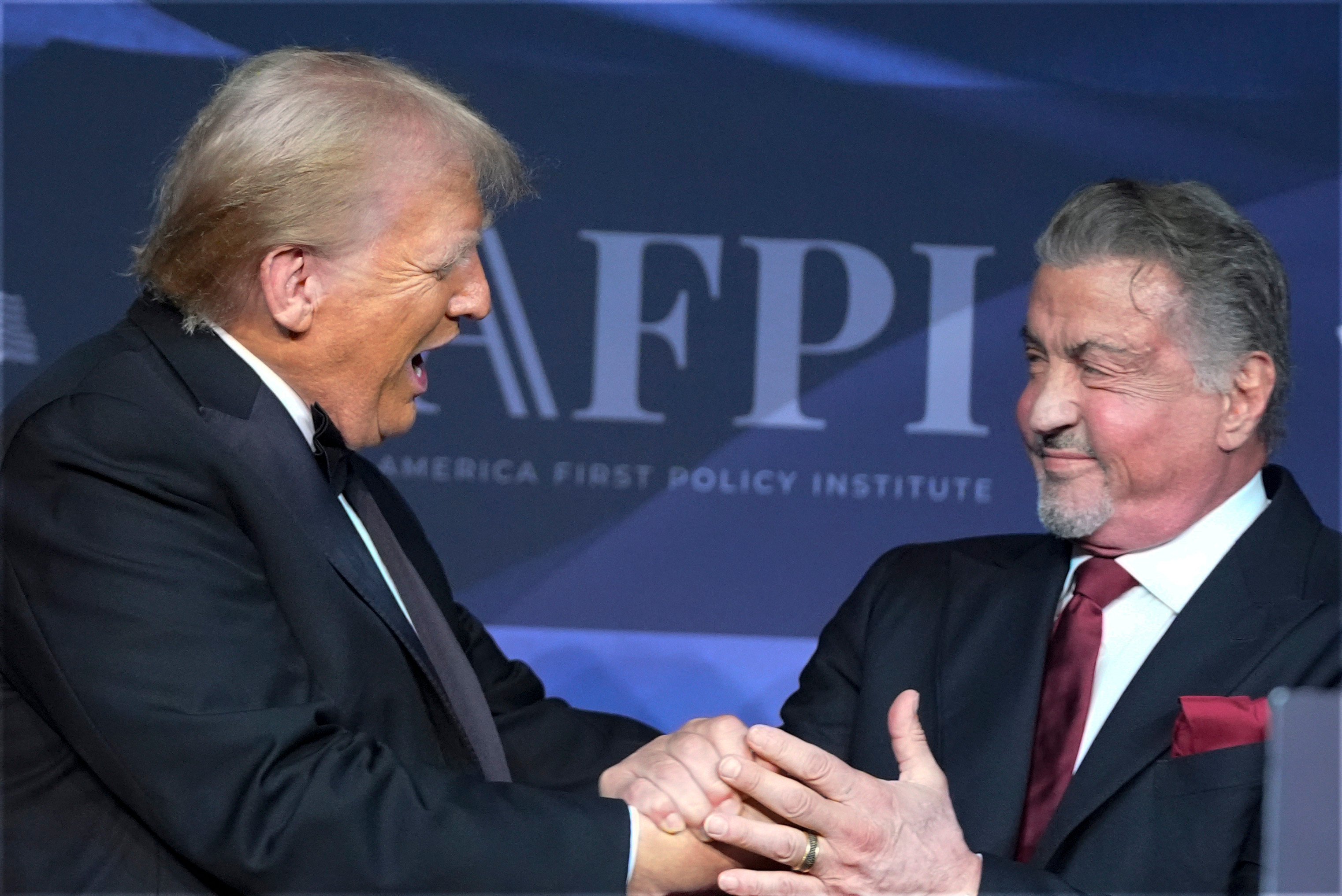 US president-elect Donald Trump greets actor Sylvester Stallone at Mar-a-Lago in November. Photo: AP