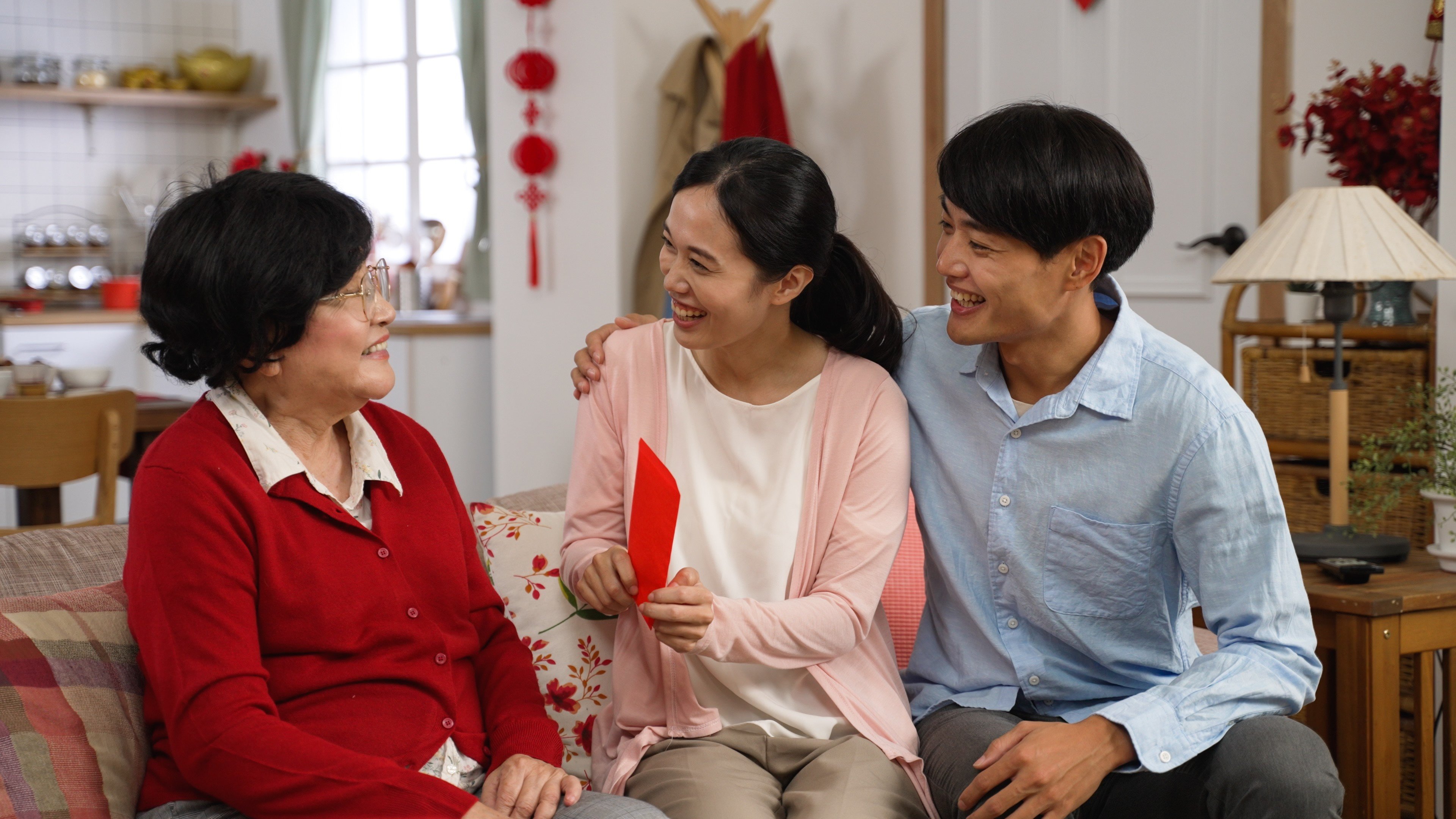 The red colour of lai see symbolises good luck and prosperity, and the amount of money inside usually ends in an even number, which is considered more auspicious. Photo: Shutterstock