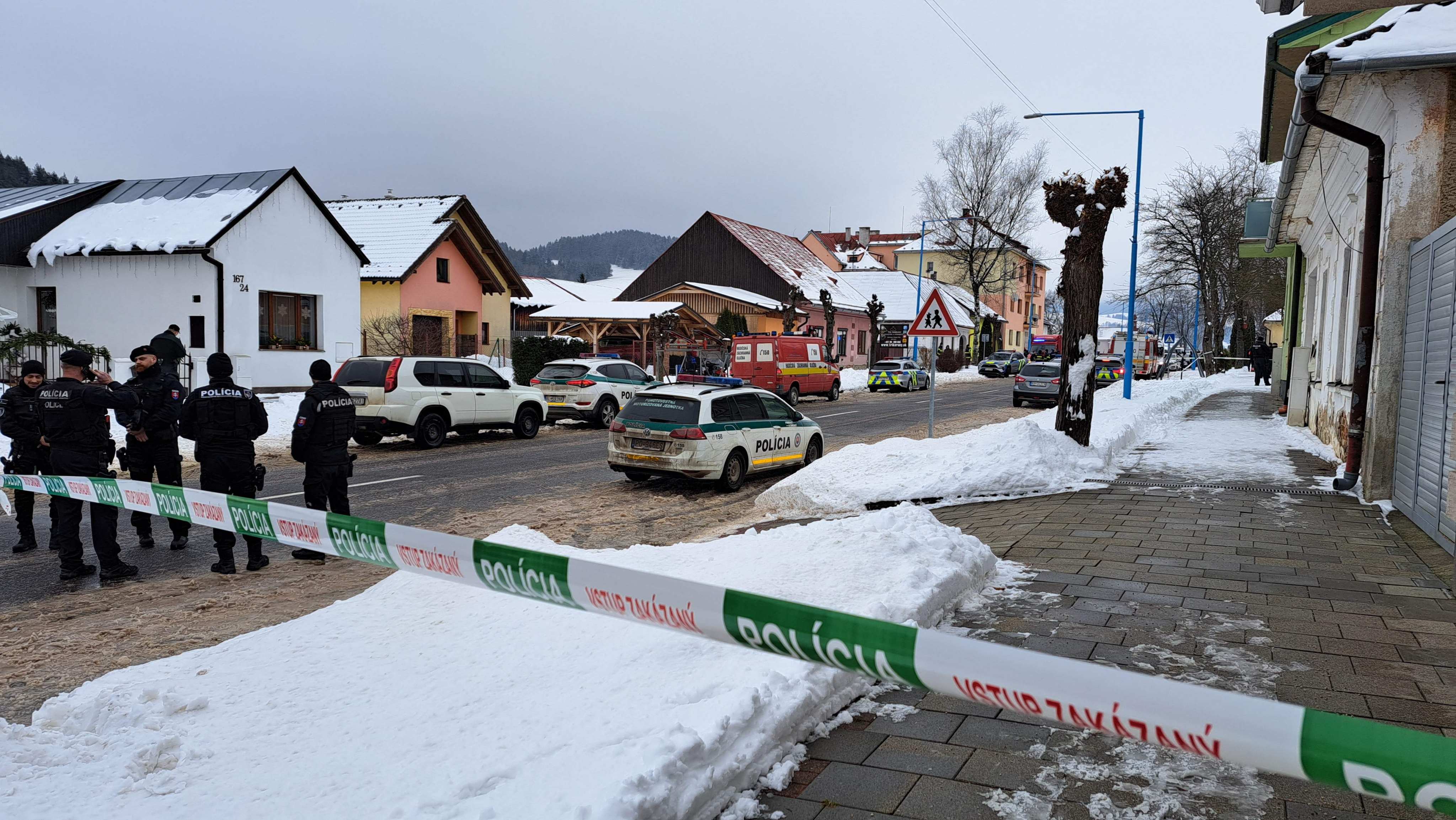 Police are seen outside a grammar school in the town of Spisska Stara Ves, eastern Slovakia where a student killed at least two people and seriously wounded another in a knife attack. Photo: AFP