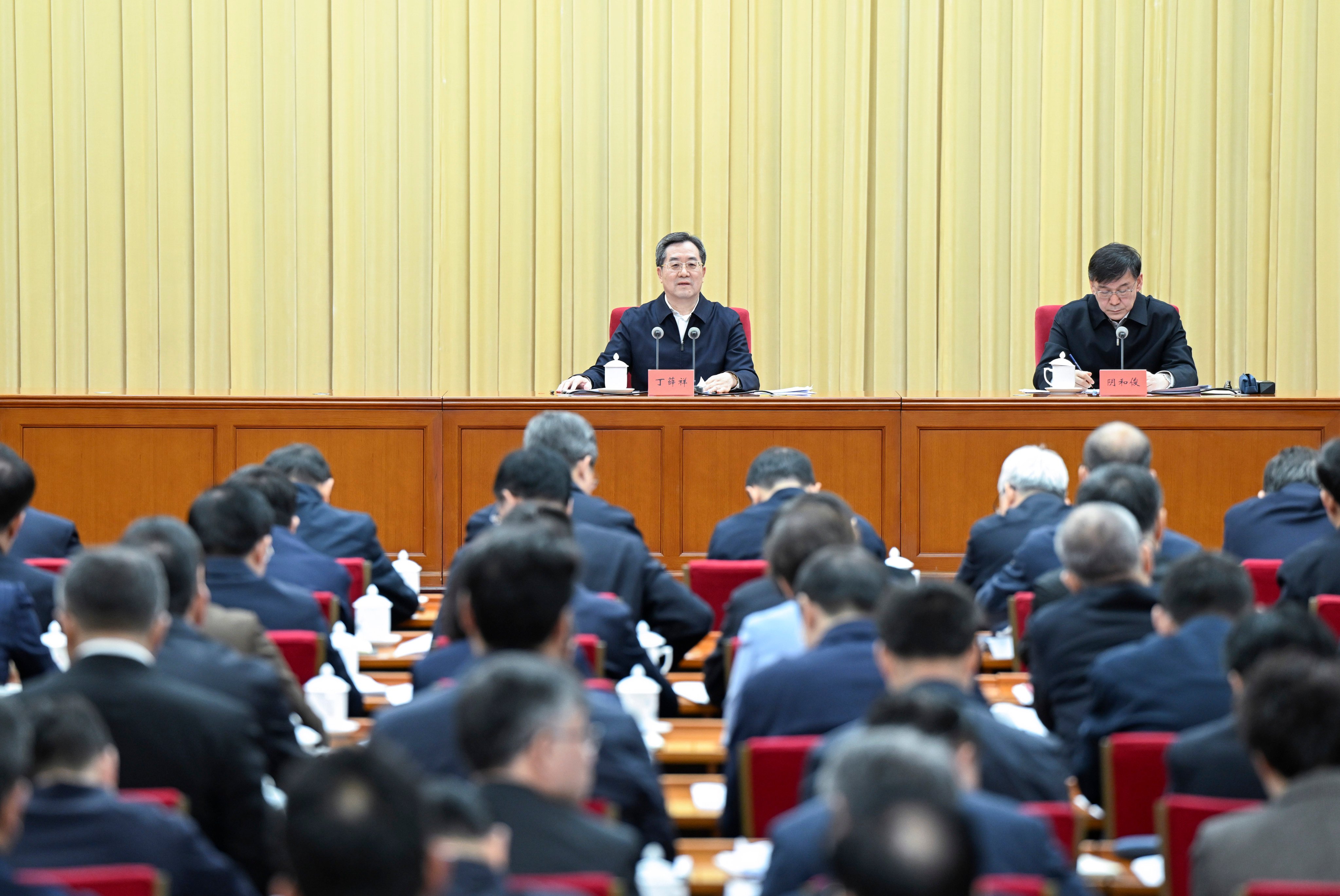 Vice-Premier and Politburo Standing Committee member Ding Xuexiang (left) chairs the national science and technology work conference with science minister Yin Hejun, in Beijing on Monday. Photo: Xinhua