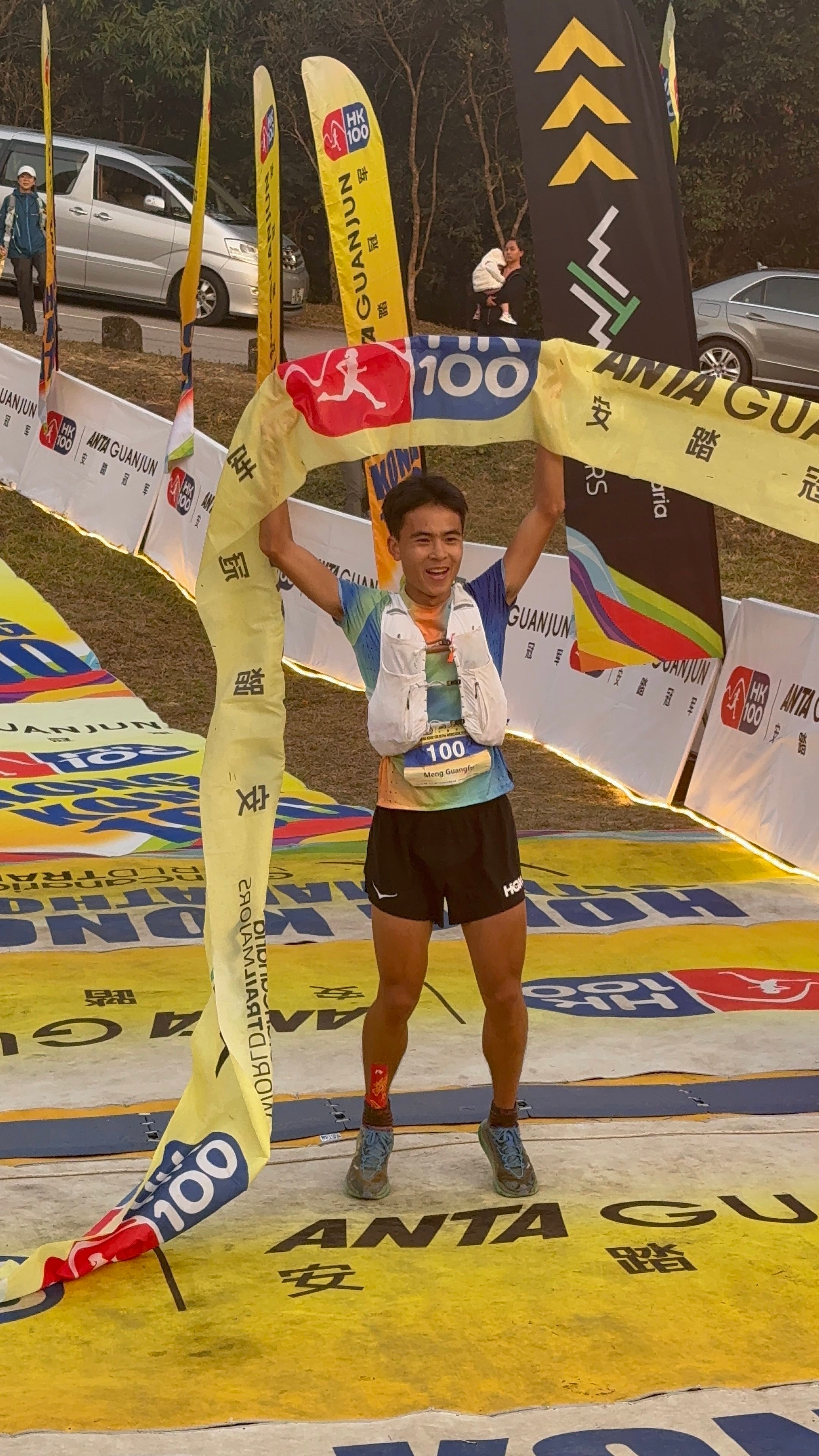 Men’s HK100 winner Meng Guangfu celebrates after his record-breaking time to seal a second successiv title. Photo: Handout