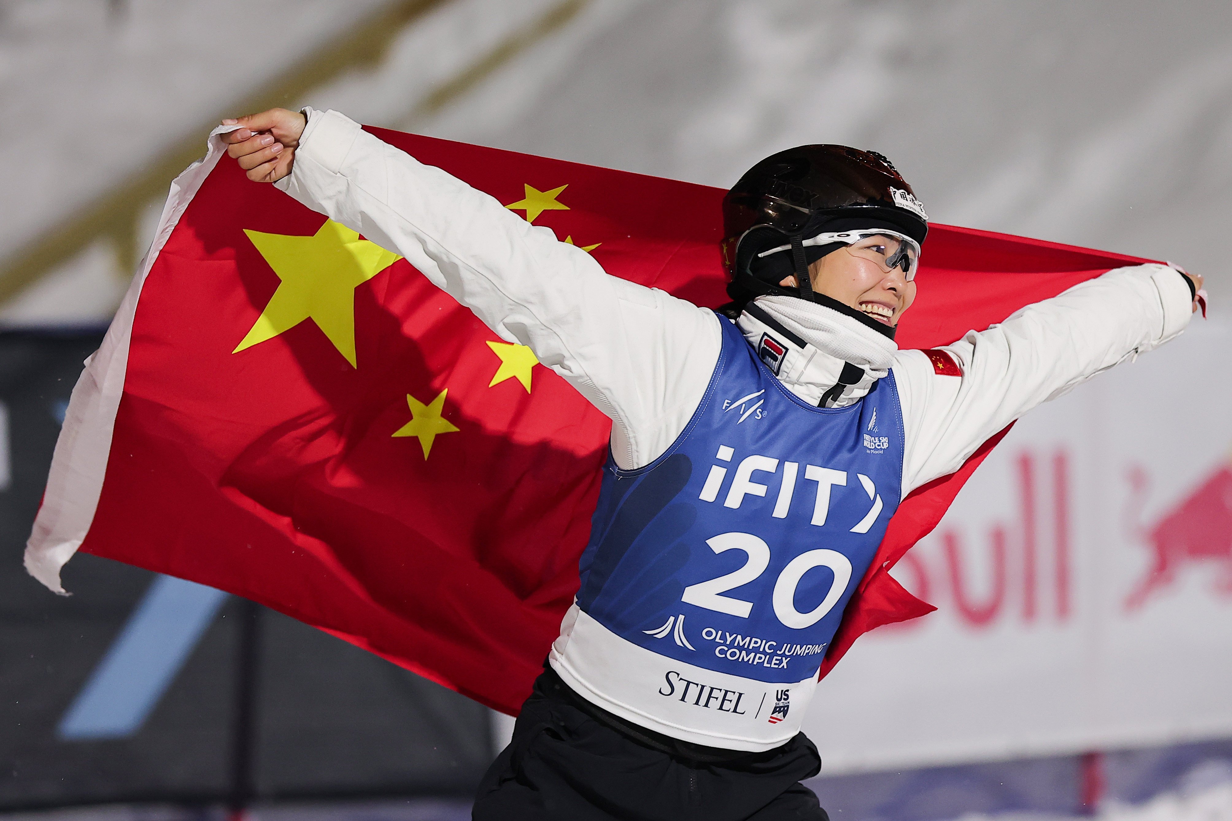 Xu Mengtao celebrates with a Chinese flag after winning the women’s aerials at FIS Freestyle World Cup at Lake Placid, New York on Saturday. Photo: Getty Images