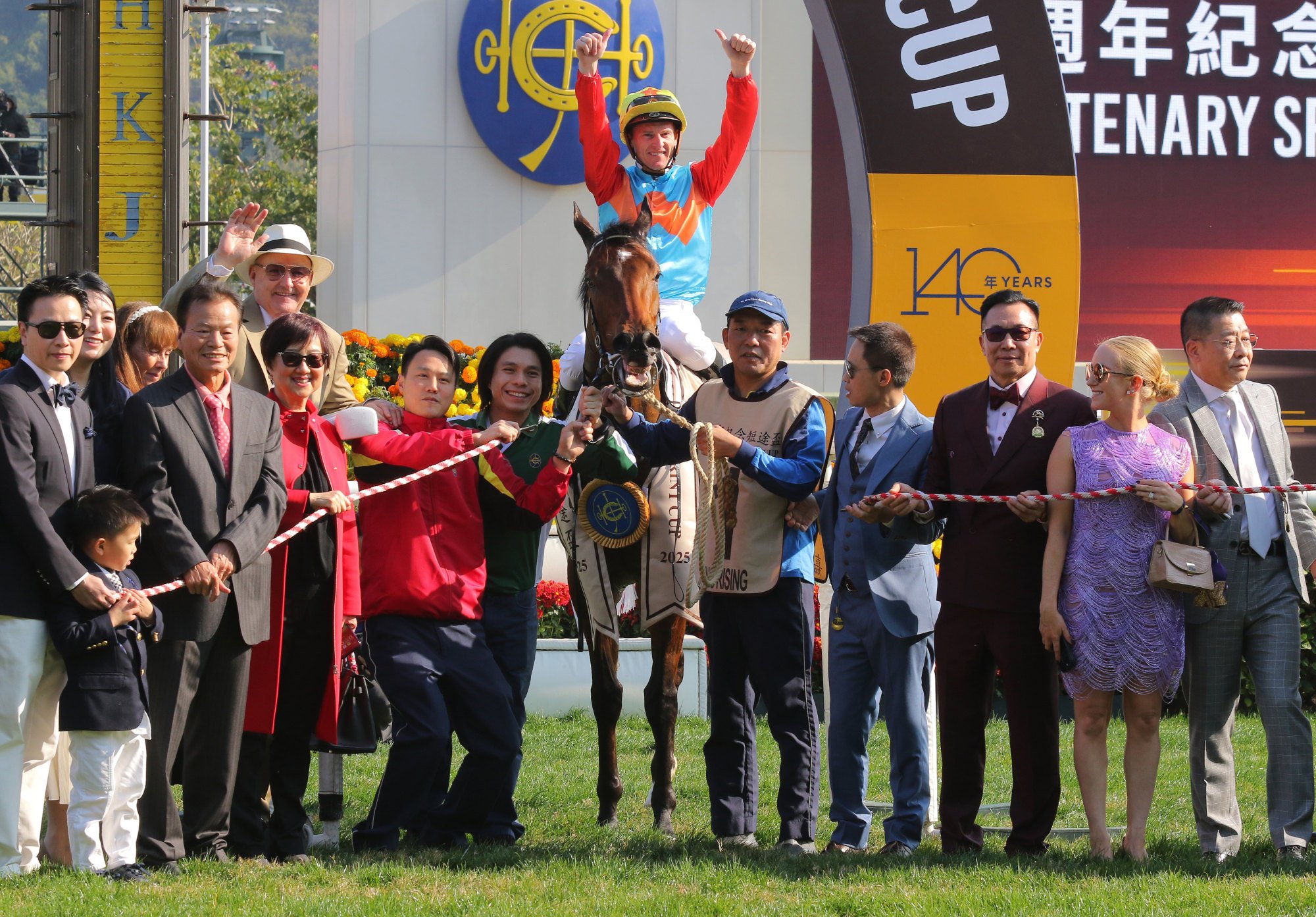 Connections of Ka Ying Rising celebrate his second Group One success.