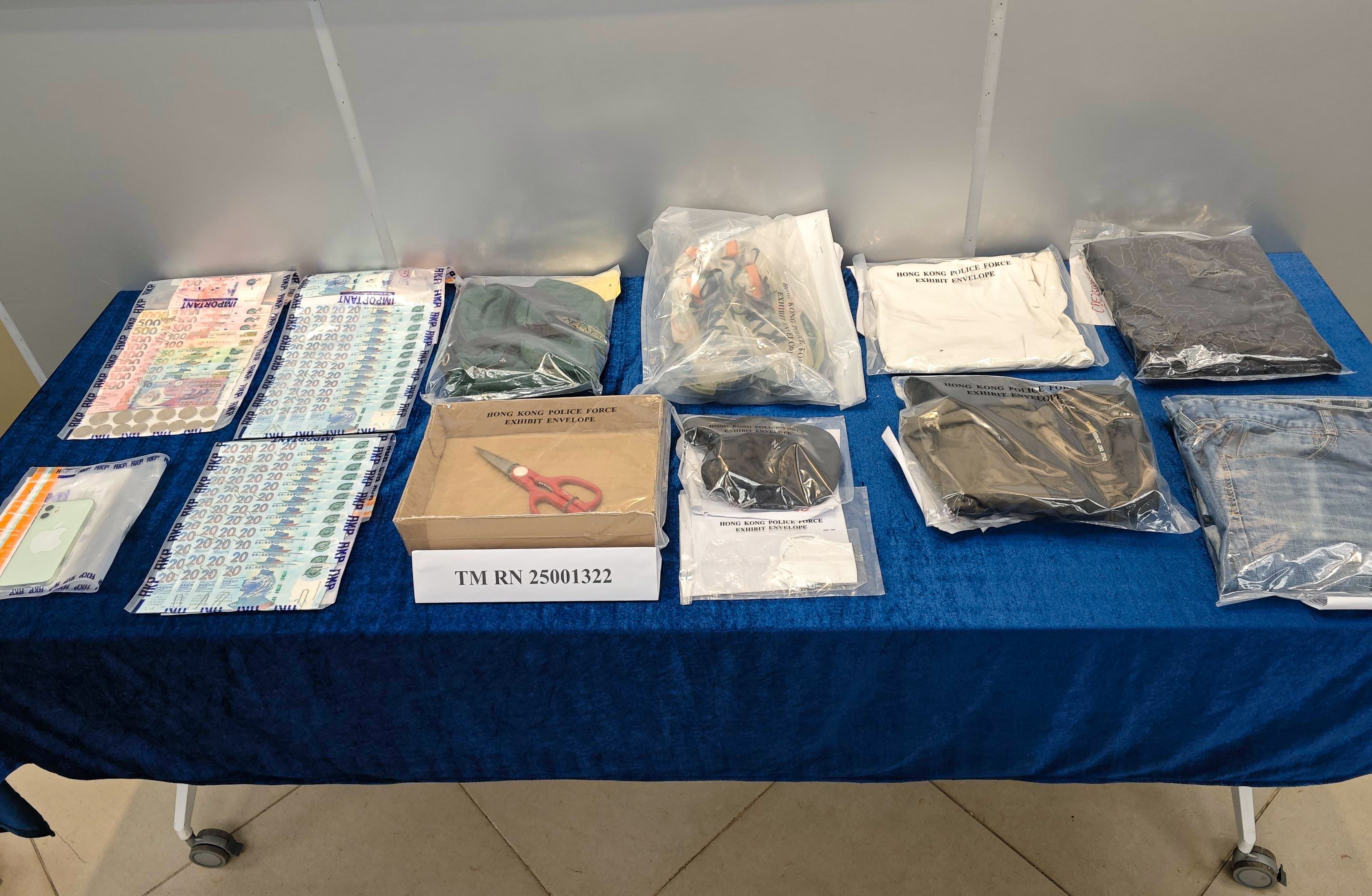 Hong Kong police display evidence in the case, including the scissors used by the suspect to threaten his elderly victim. Photo: Handout