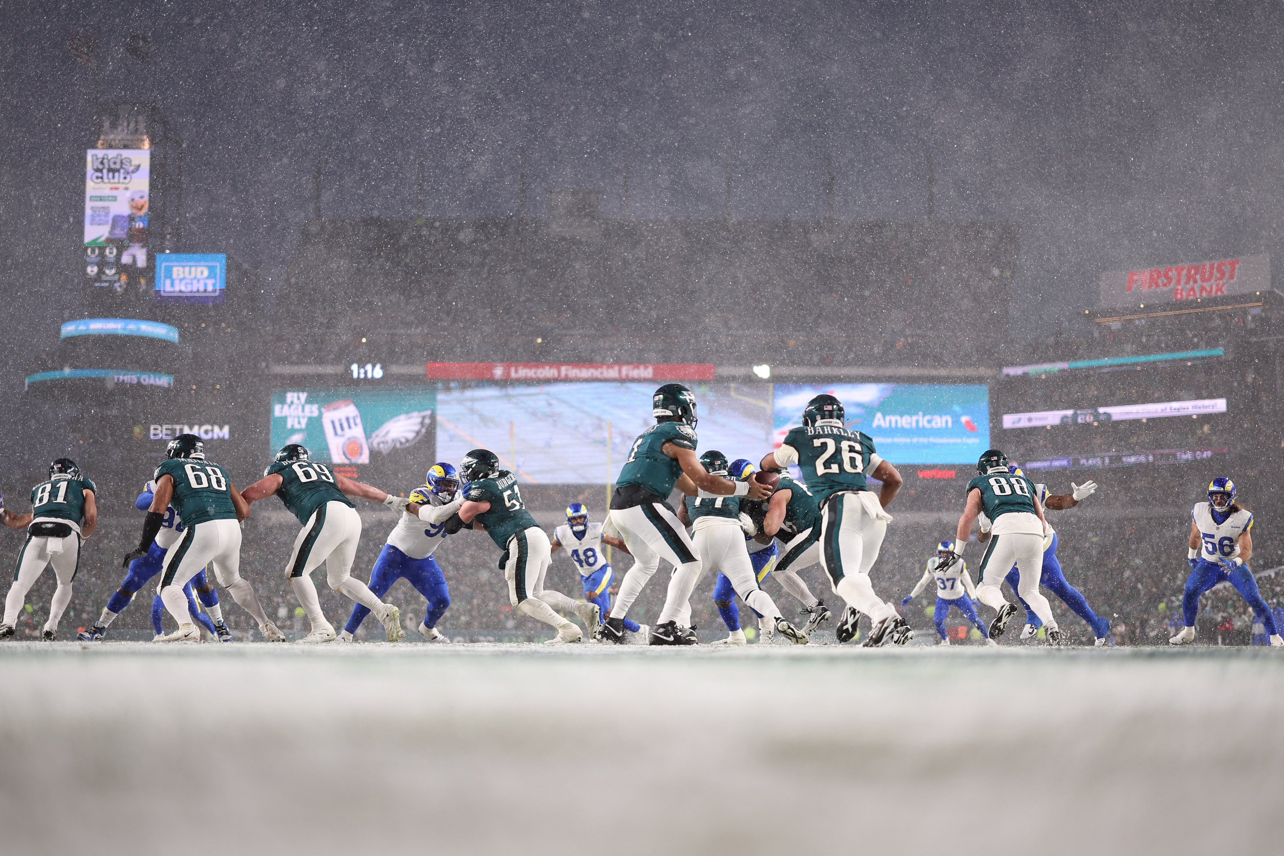 Philadelphia Eagles quarterback Jalen Hurts  hands the ball to Saquon Barkley in the third quarter against the Los Angeles Rams at Lincoln Financial Field. Photo: Reuters