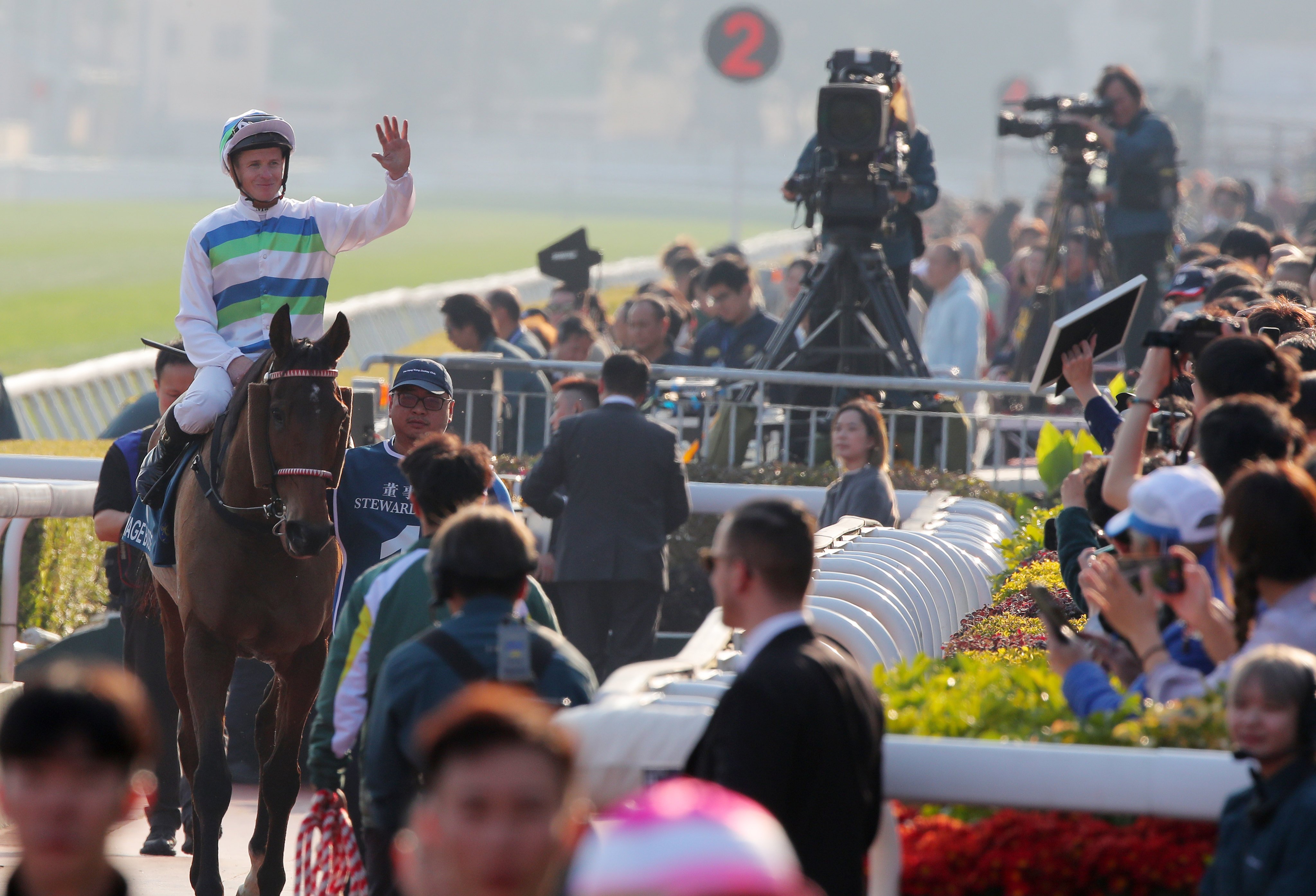 James McDonald waves to the Sha Tin crowd after Voyage Bubble’s win on Sunday. Photo: Kenneth Chan