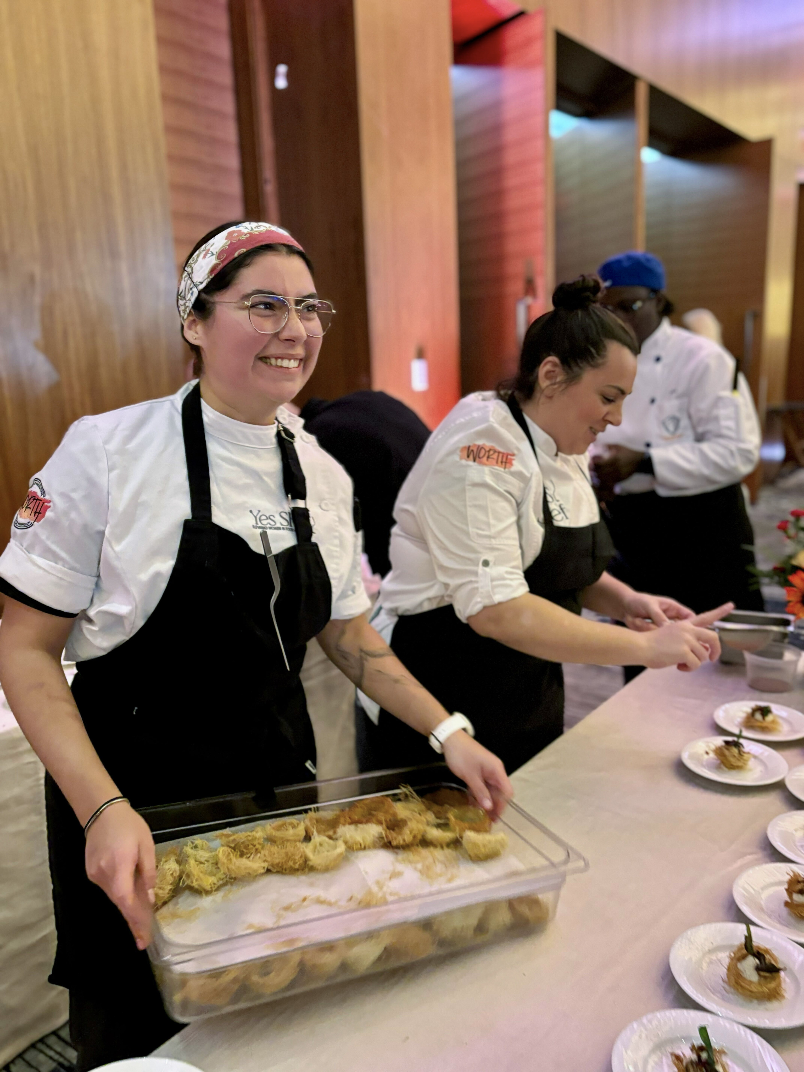 Samantha Garizurieta (left) one of 30 female chefs and trainee chefs who took part in Yes Shef, a fundraiser in Vancouver, Canada, for the Worth Association. Photo: Vision Event Photography