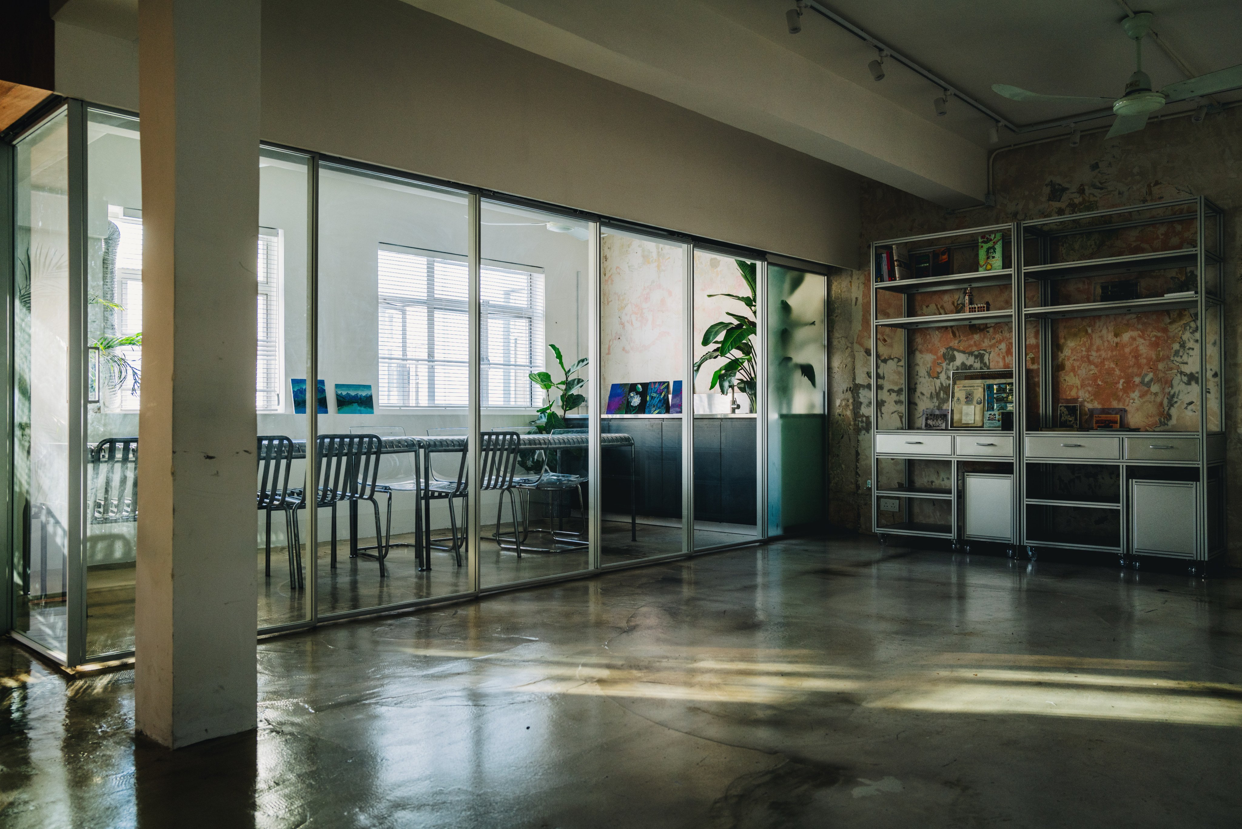 Diversity Hub, a multifunctional space in Chungking Mansions in Hong Kong run by Christian Charity, includes glass panels that can be used to create distinct rooms such as a kitchen and exhibition area. Photo: Jocelyn Tam