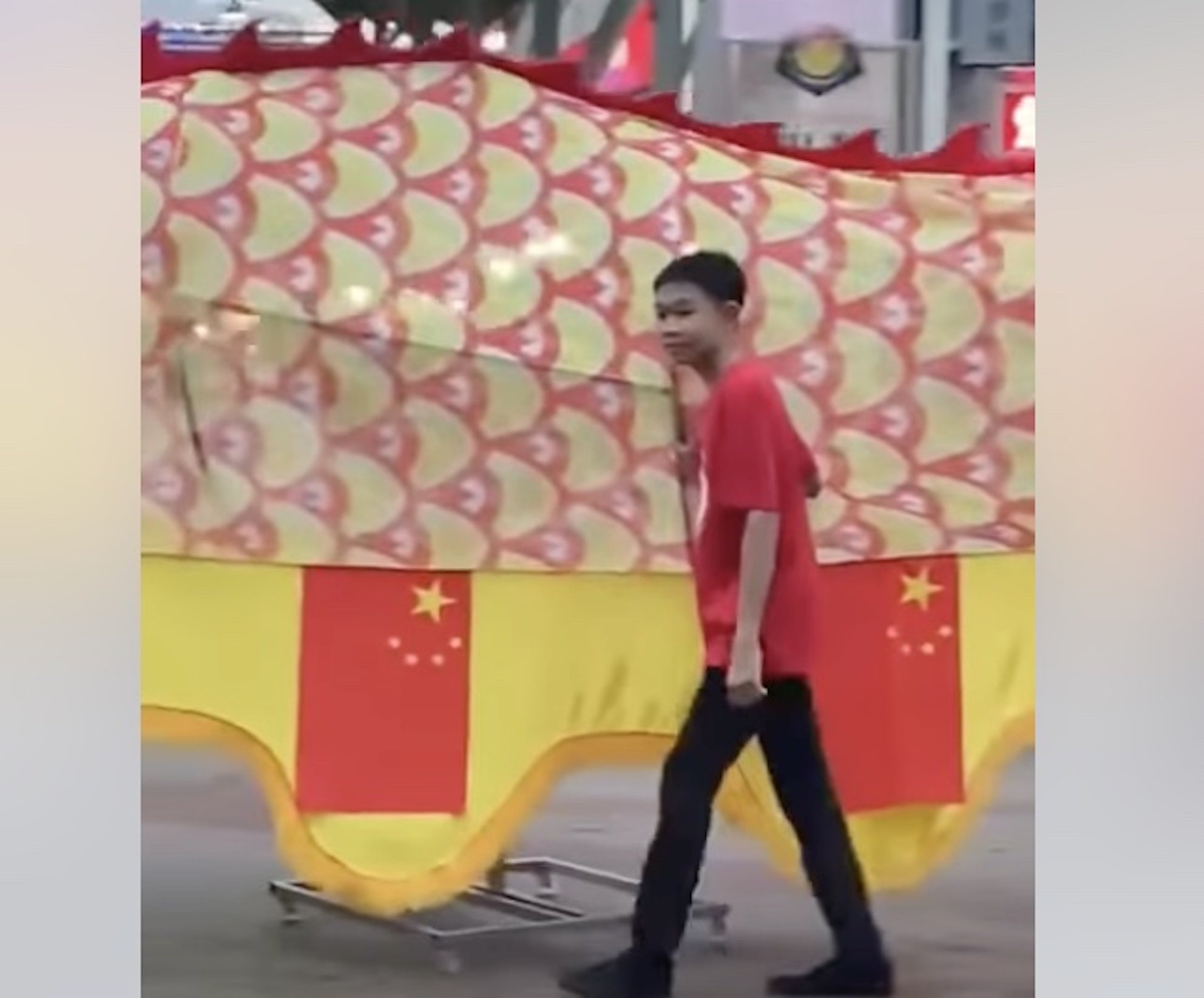 A giant dragon puppet decorated with flags of China on one side at a parade in Muar, Johor, has prompted a probe by Malaysian police. Photo: Kelab Info Malaysia/Facebook