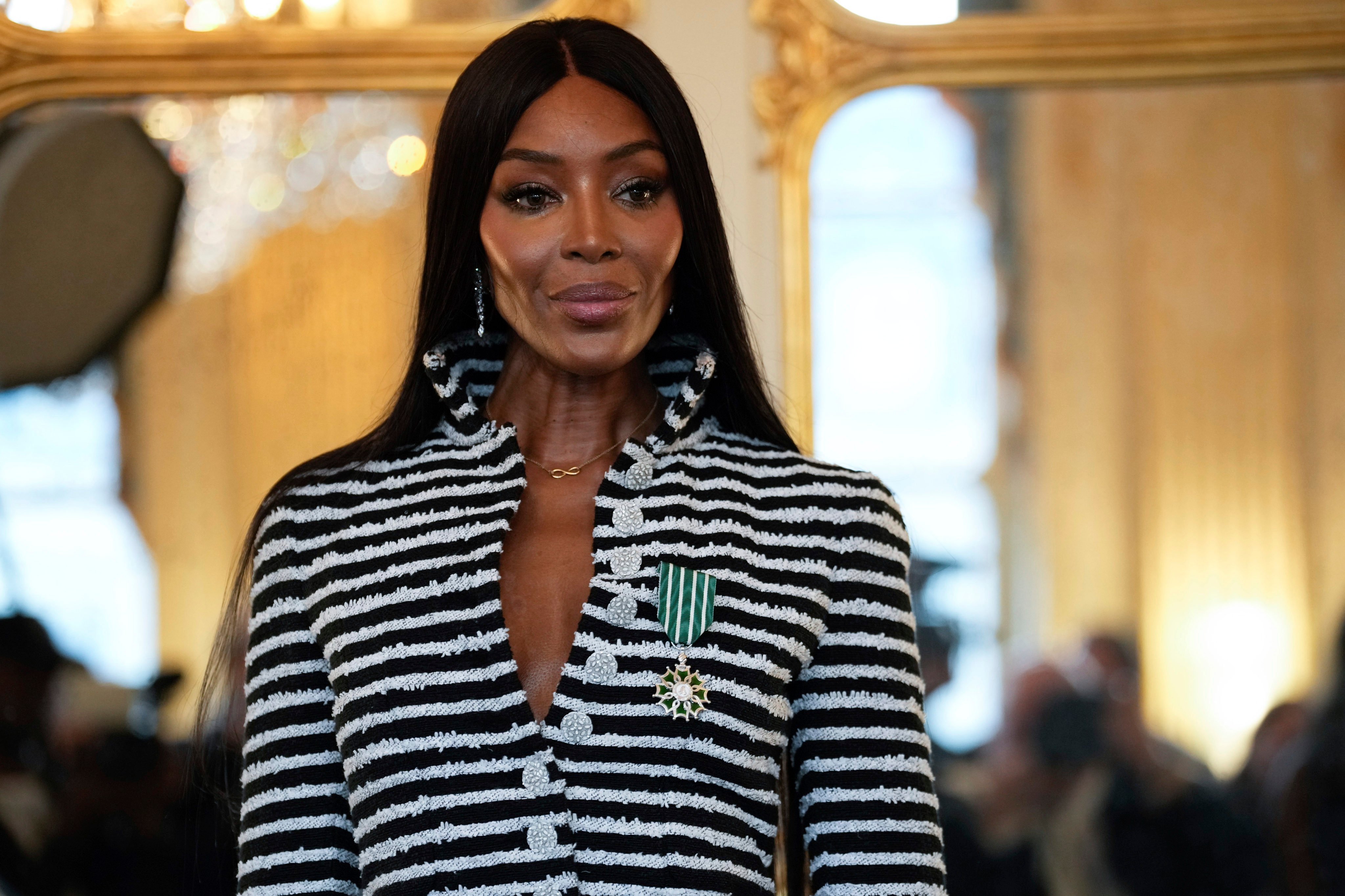 Naomi Campbell poses with the medal of “Chevalier de l’Ordres des Arts et des Lettres” at the culture ministry in Paris in September 2024. Photo: AP