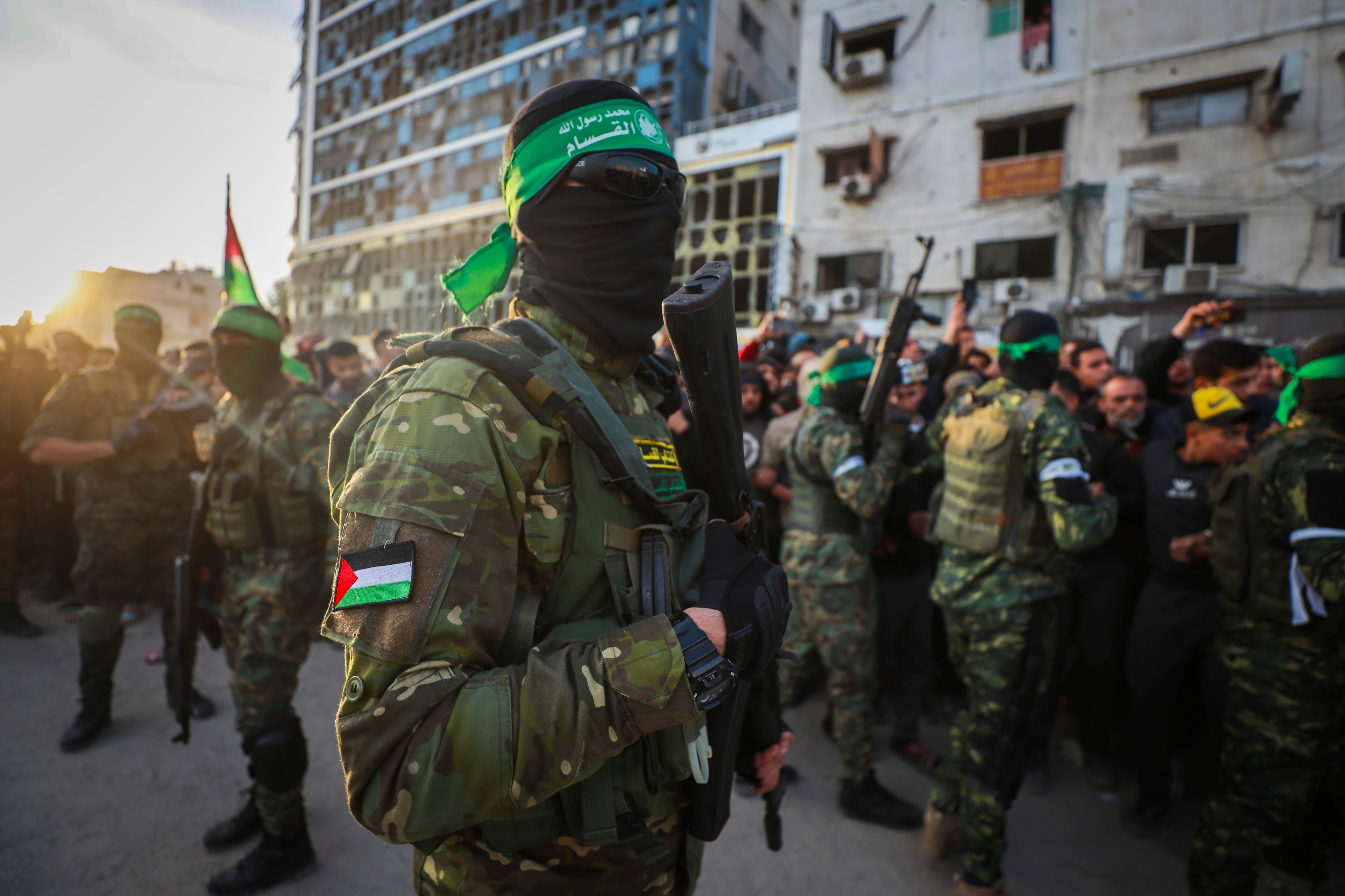 Hamas fighters wearing green headbands and military fatigues in Gaza City on Sunday. Photo: AP