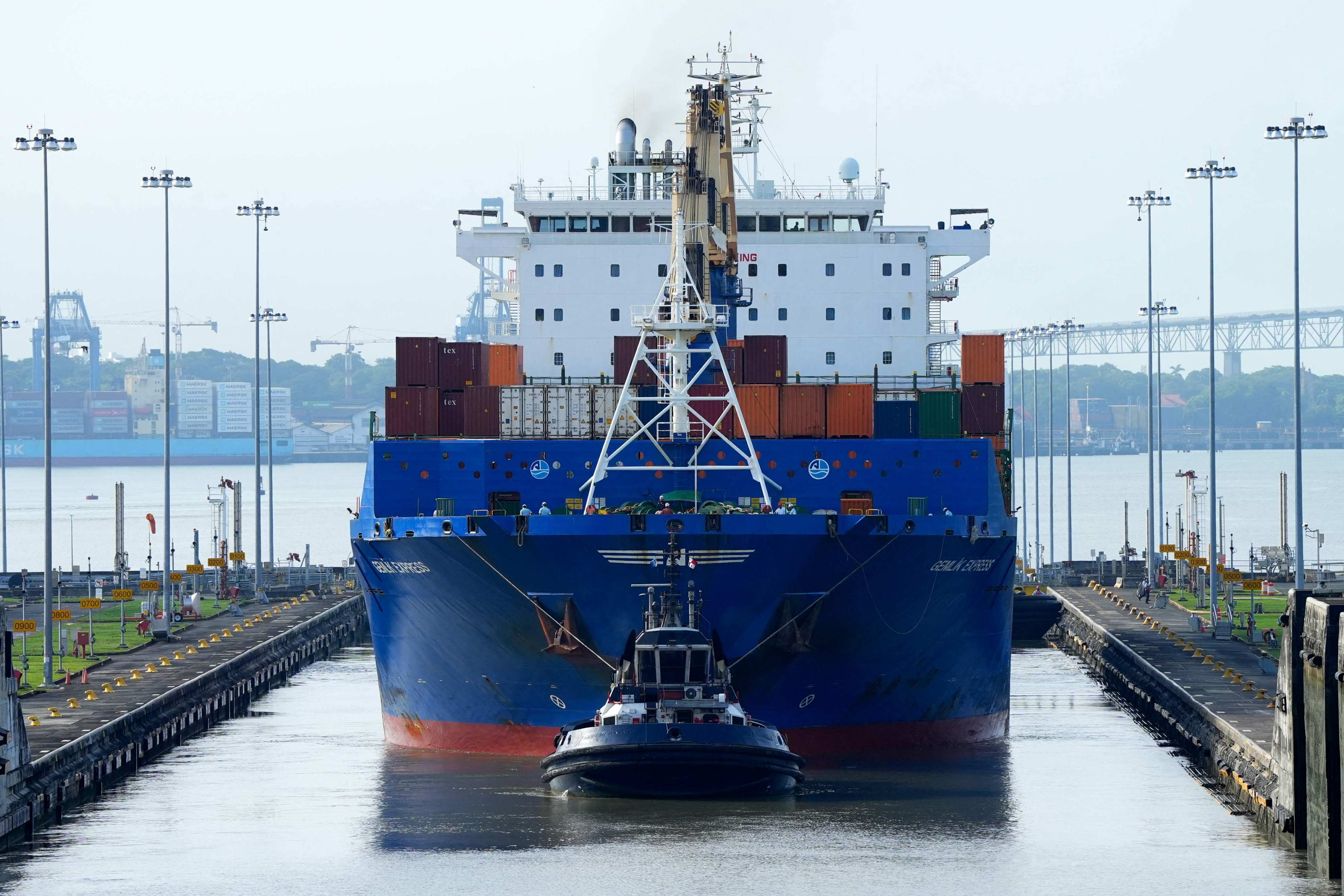 A cargo ship and tugboat sail through the Cocoli Locks at the Panama Canal. US President Donald Trump pledged during his inaugural speech on Monday that the United States would be “taking back” the canal. Photo: AFP