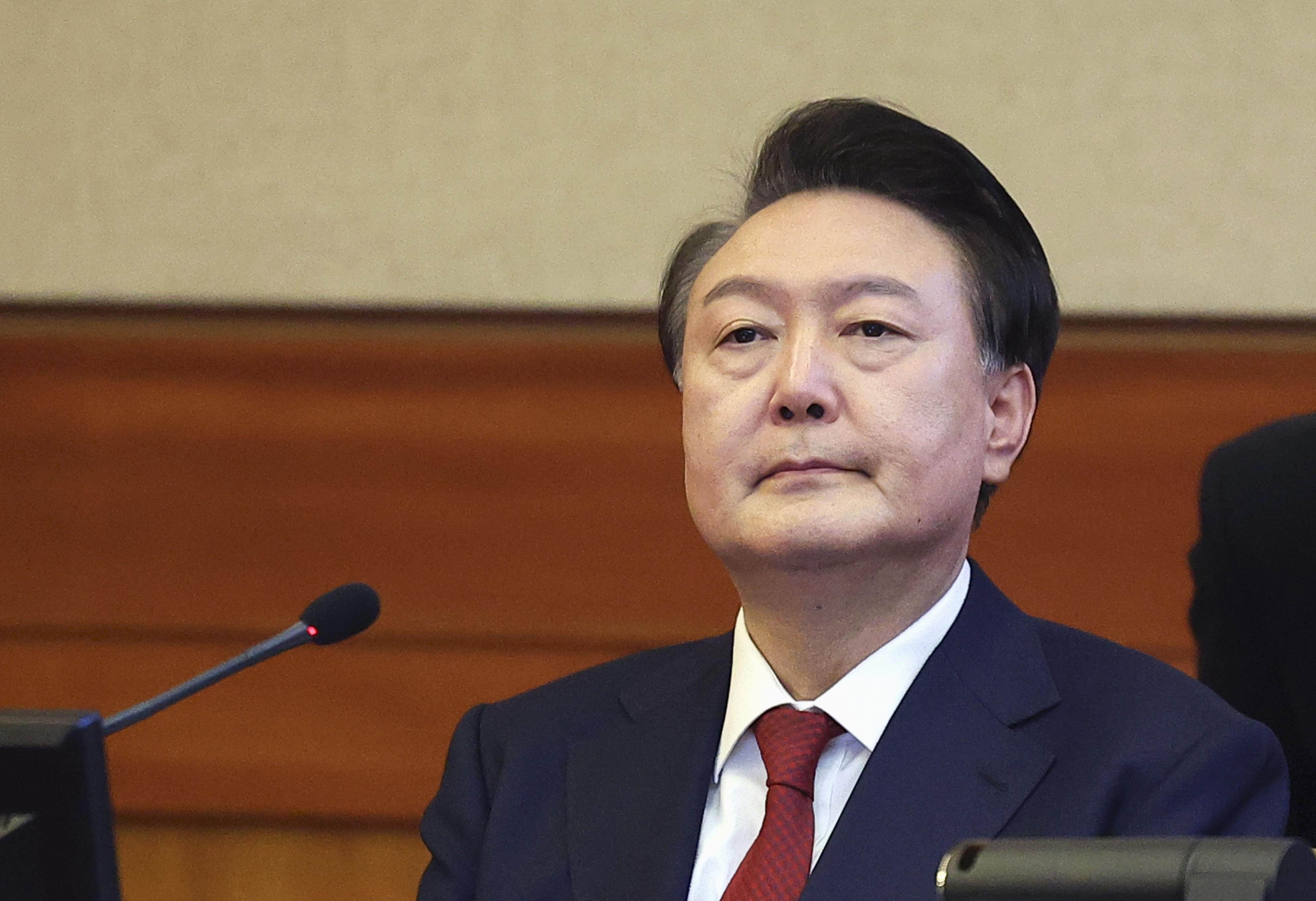 Impeached South Korean President Yoon Suk-yeol attends his impeachment trial at the Constitutional Court for the first time in Seoul on January 21, 2025. Photo: Kyodo/Pool