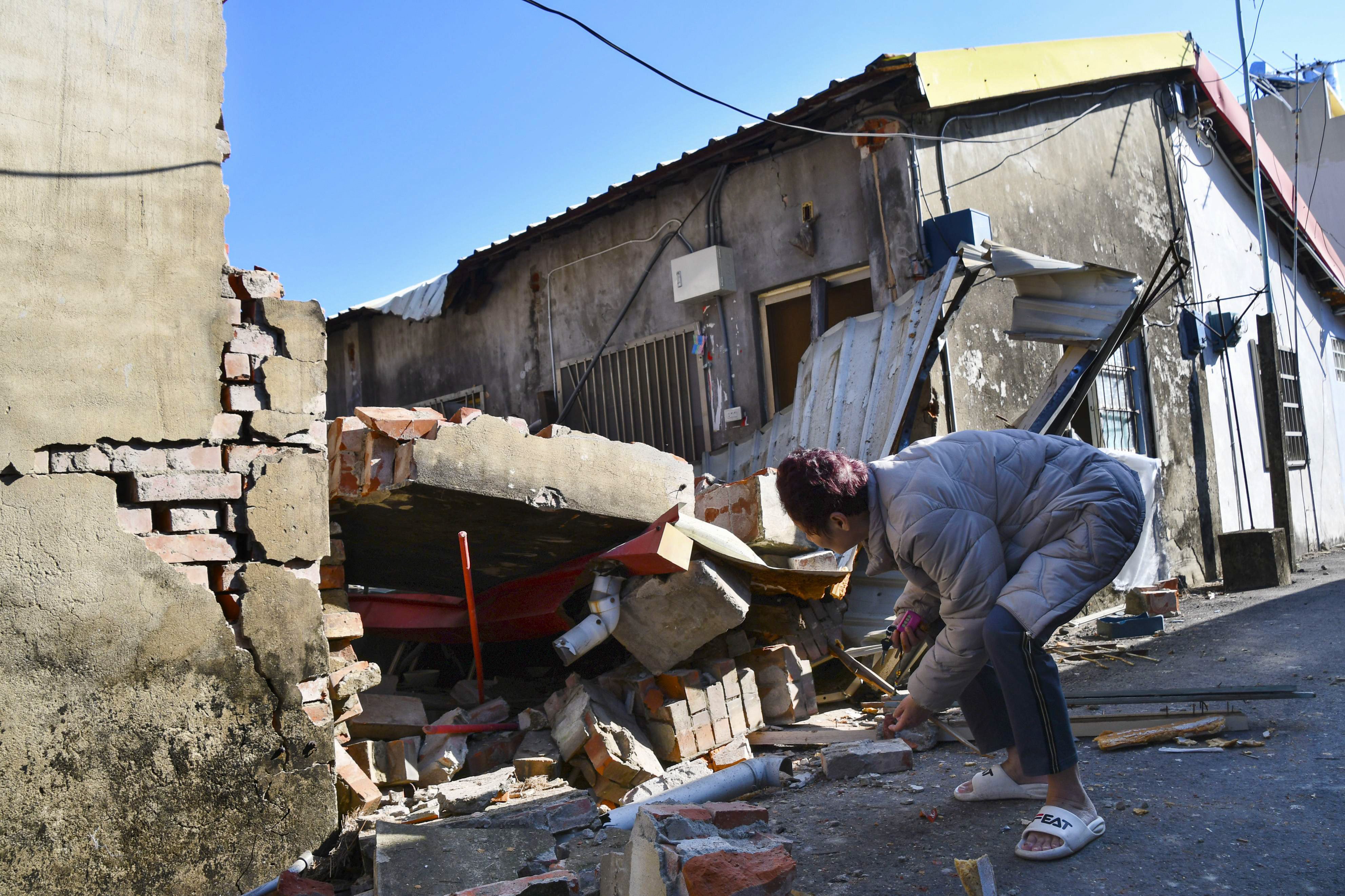 At least 27 people were injured and dozens of homes were damaged when a powerful earthquake jolted southwestern Taiwan in the early hours of Tuesday. Photo: Kyodo