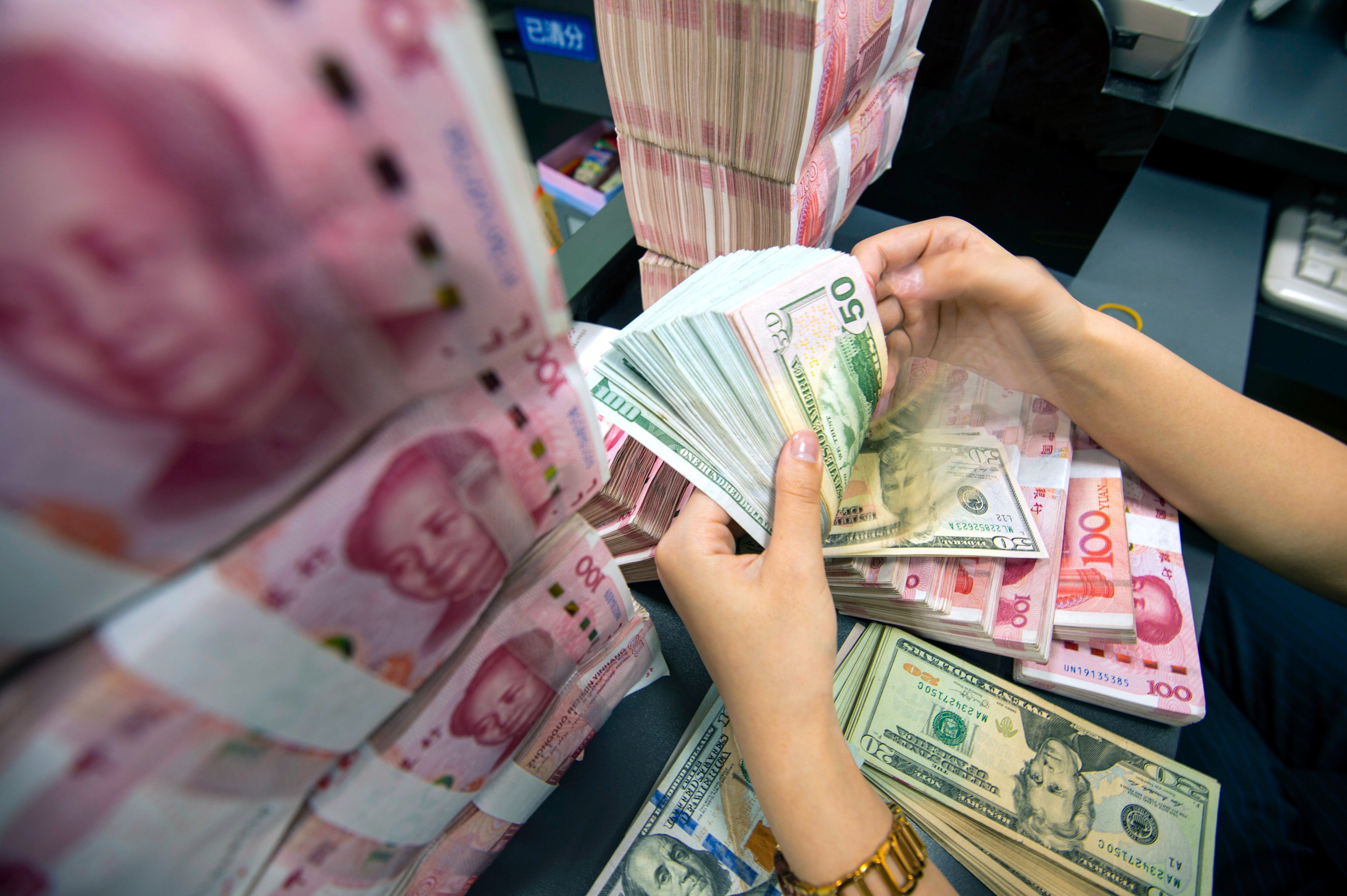 The Chinese yuan surged against the US dollar on Monday following US President Donald Trump’s inaugural address, which struck a softer-than-expected tone on China. Photo: EPA