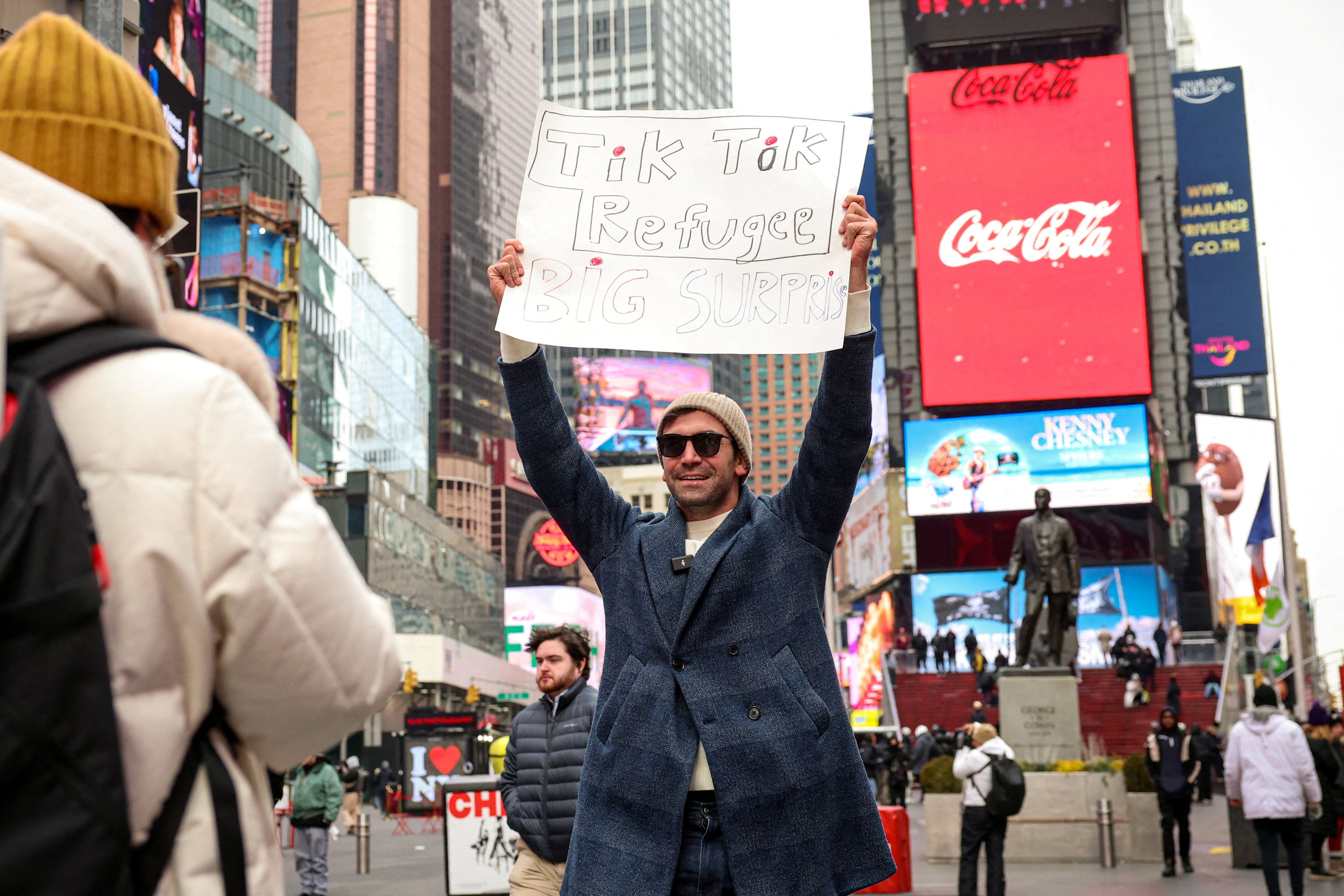 A social media influencer films a video for his new RedNote account, after leaving TikTok, in Times Square in New York City, US, on January 16. Photo: Reuters 