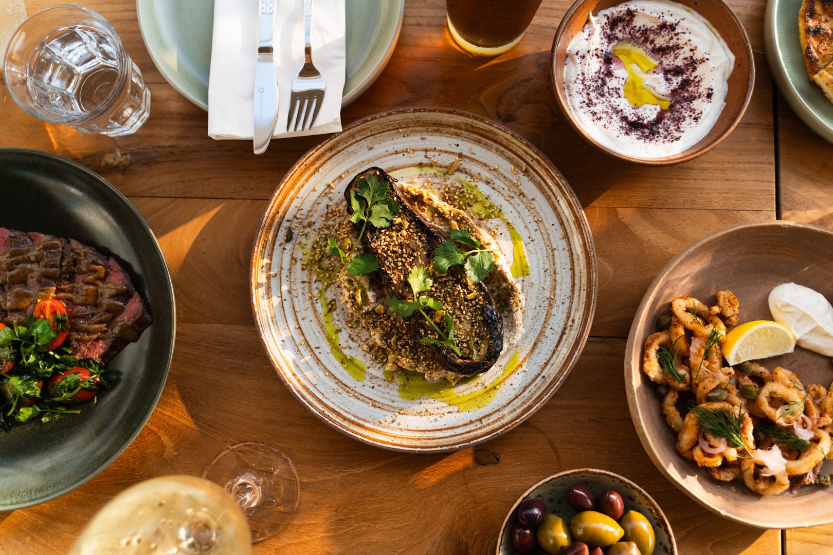 Roasted eggplant with whipped tahini and pistachio. Photo: Terracotta Lamma