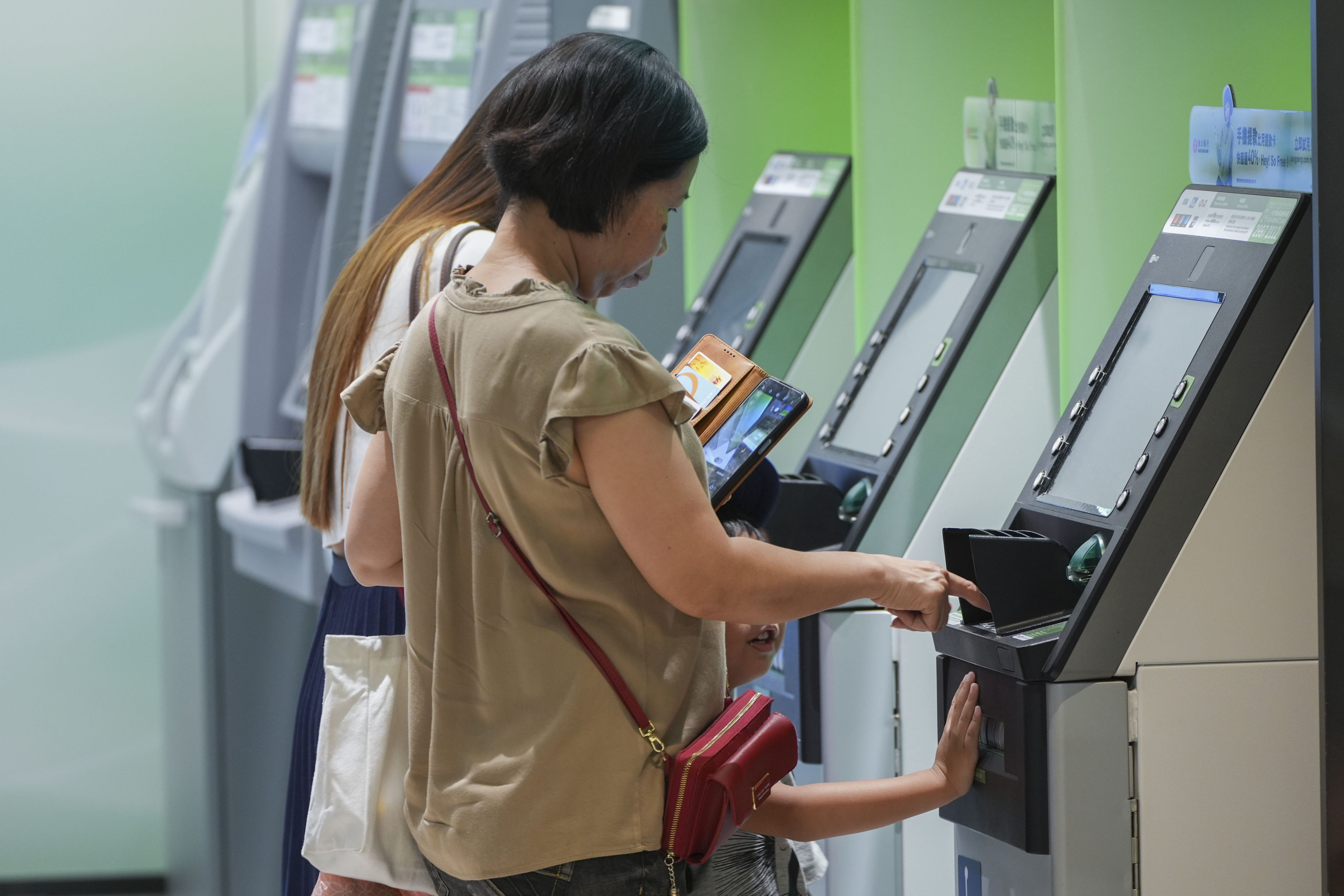 ATM machines in Central on 4 August 2024. Photo: Eugene Lee