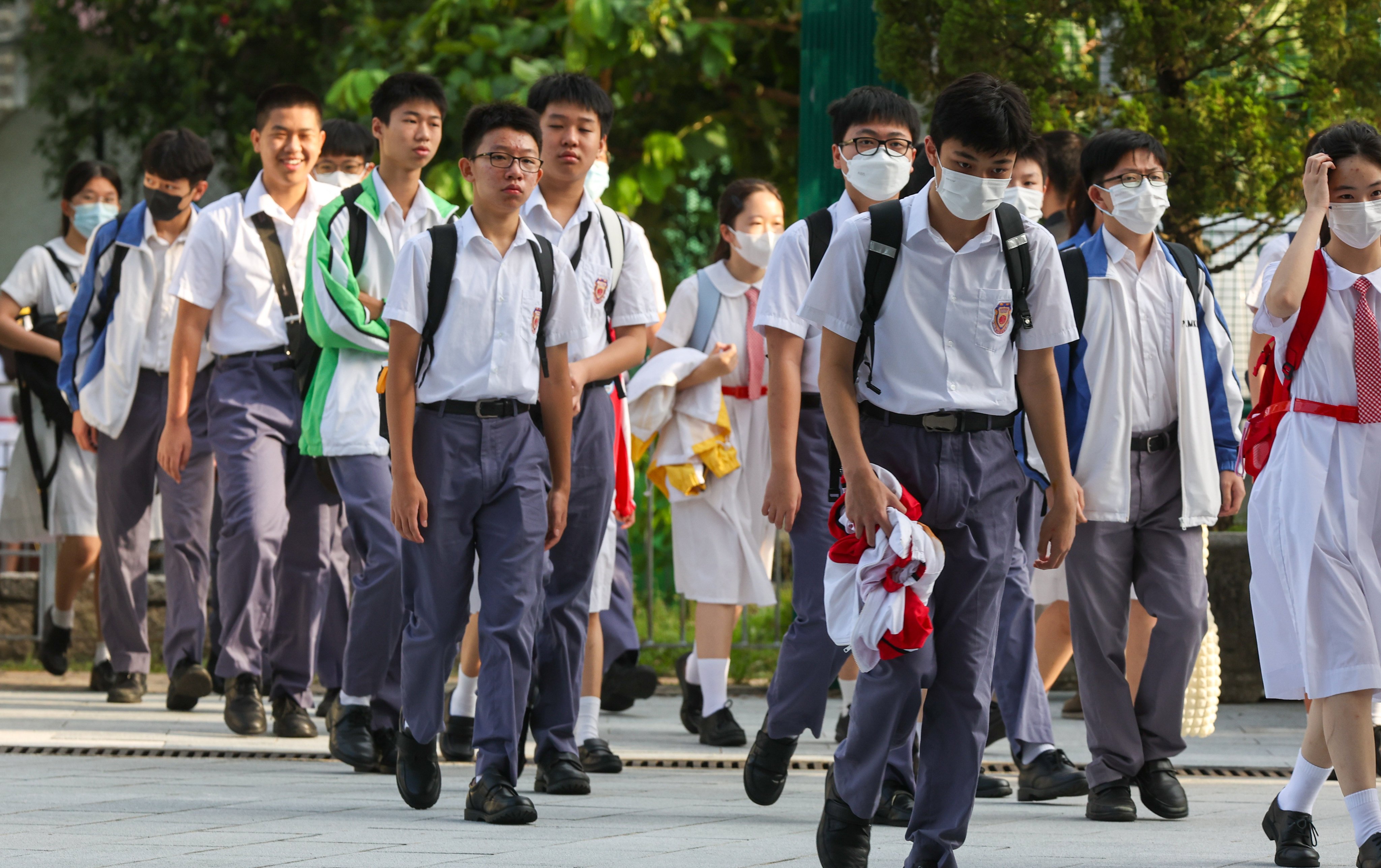 Students return to school on the first day of the academic year at Po Leung Kuk Ma Kam Ming College in Fanling in 2023. Photo: Edmond So