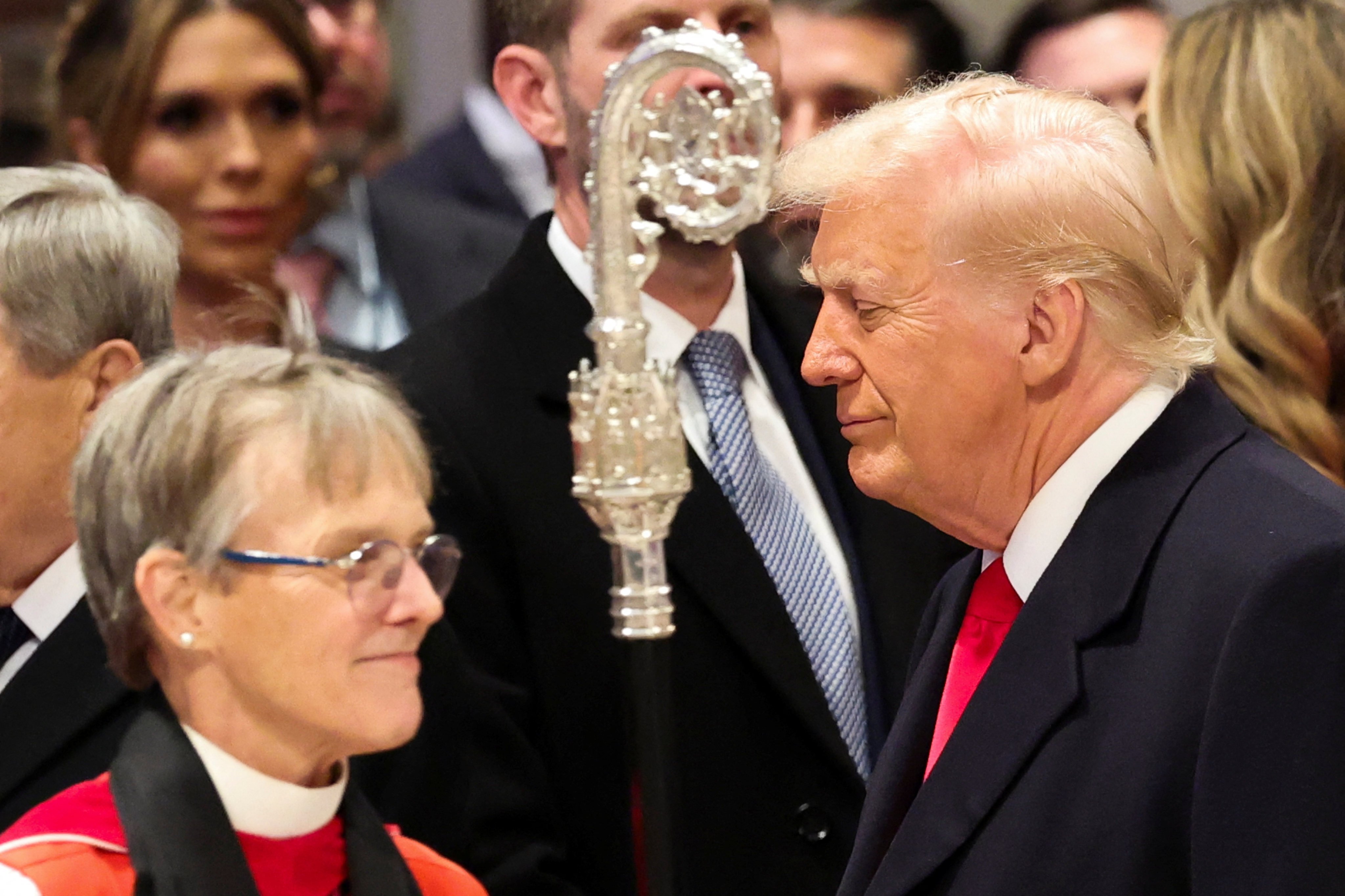 US President Donald Trump stands near Reverend Mariann Edgar Budde as he attends the National Day of Prayer Service at the Washington National Cathedral on Tuesday. Photo: Reuters