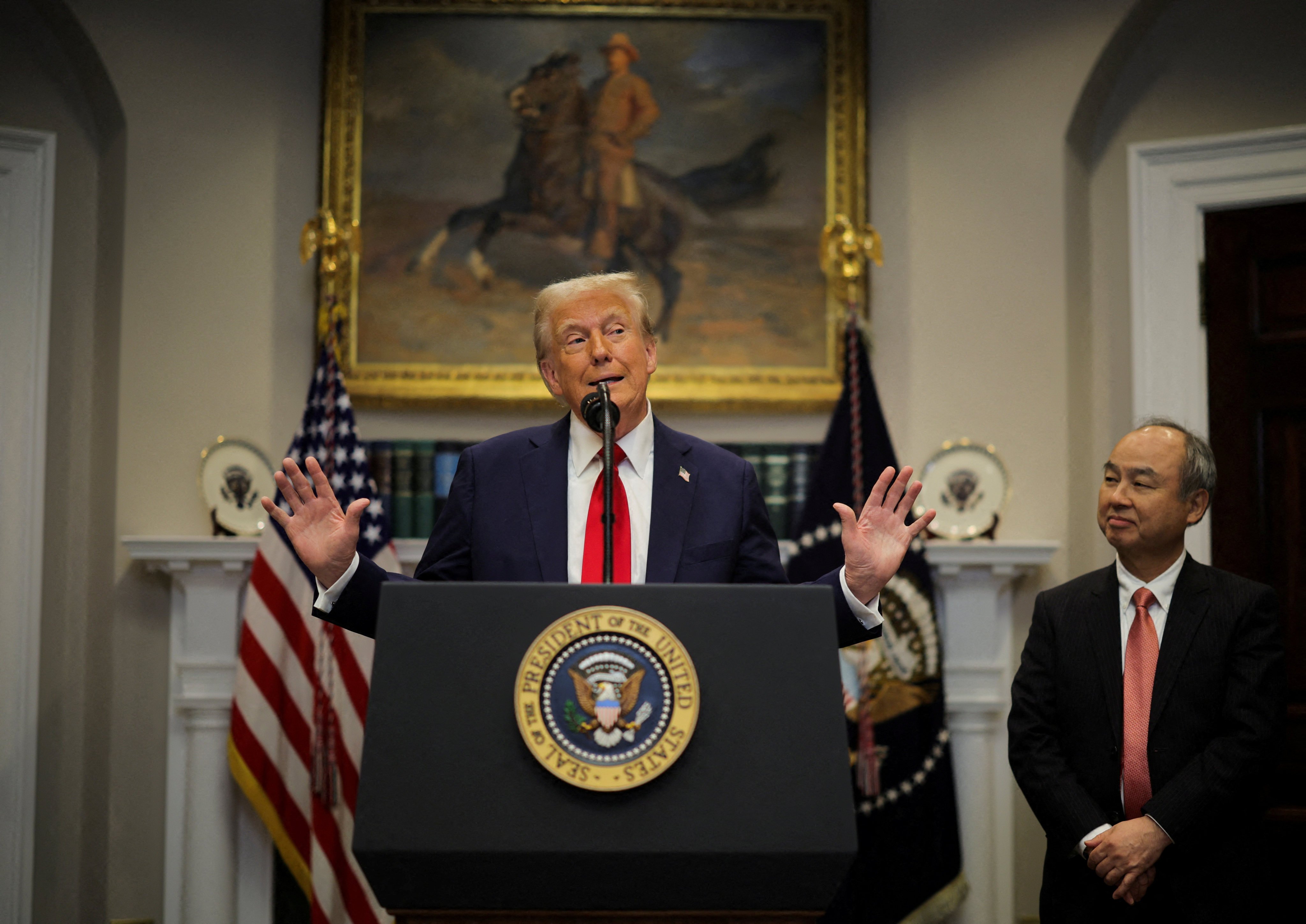 US President Donald Trump speaks at the White House on January 21. Photo: Reuters