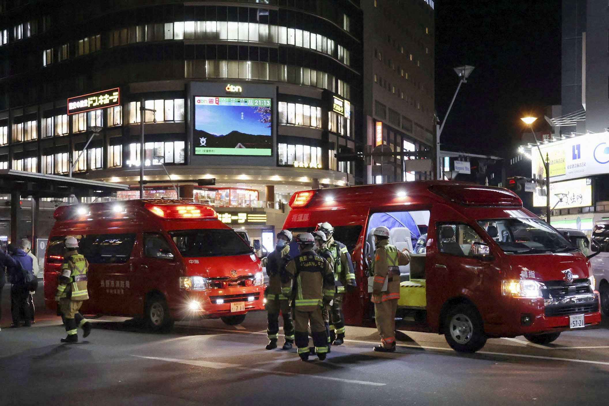 Paramedics stand at the site where multiple people were stabbed in front of JR Nagano Station in Nagano. Photo: Reuters