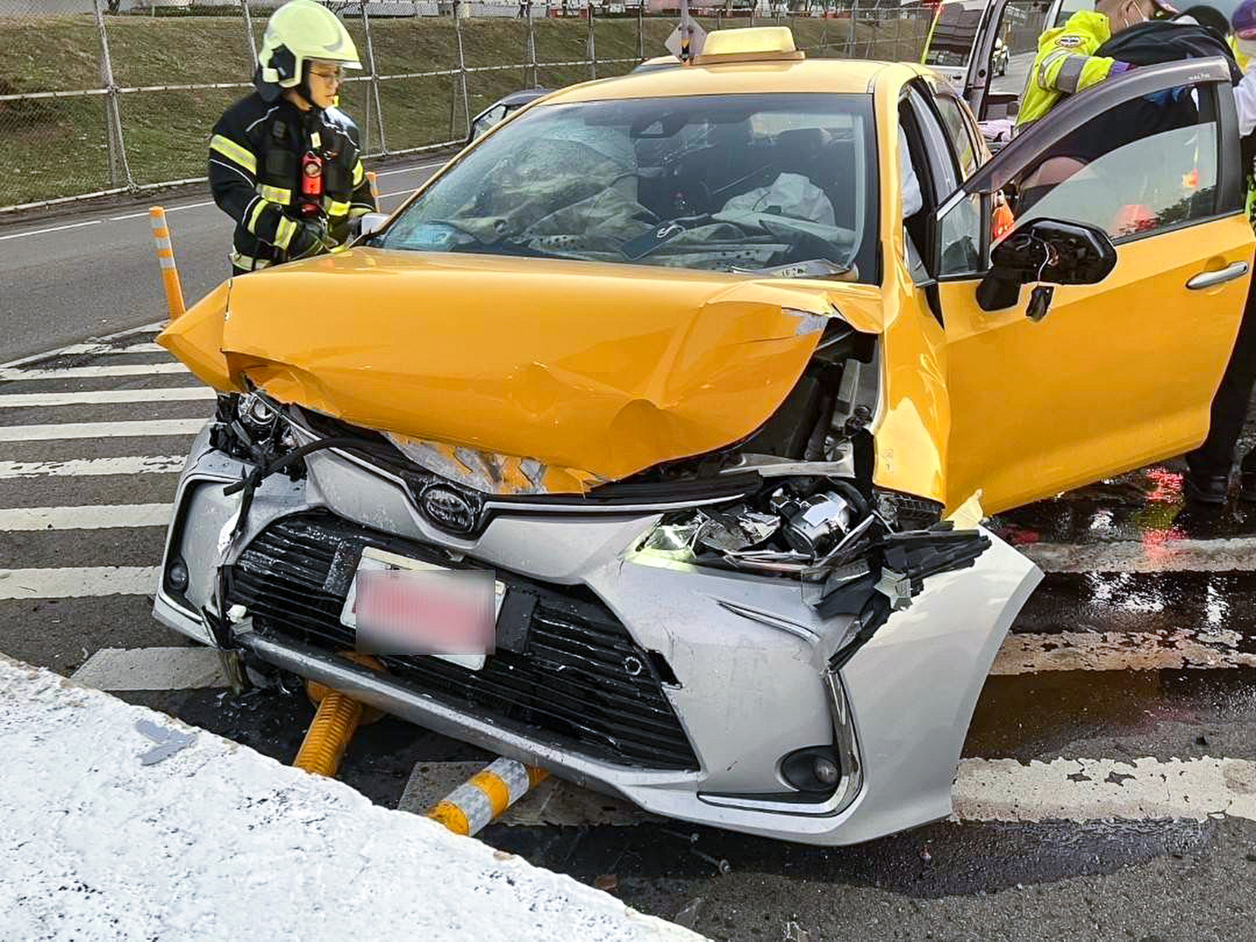 Taiwanese media reported that a Hong Kong tourist was seriously injured after the taxi that she was in hit a traffic island at an airport. Photo: CNA