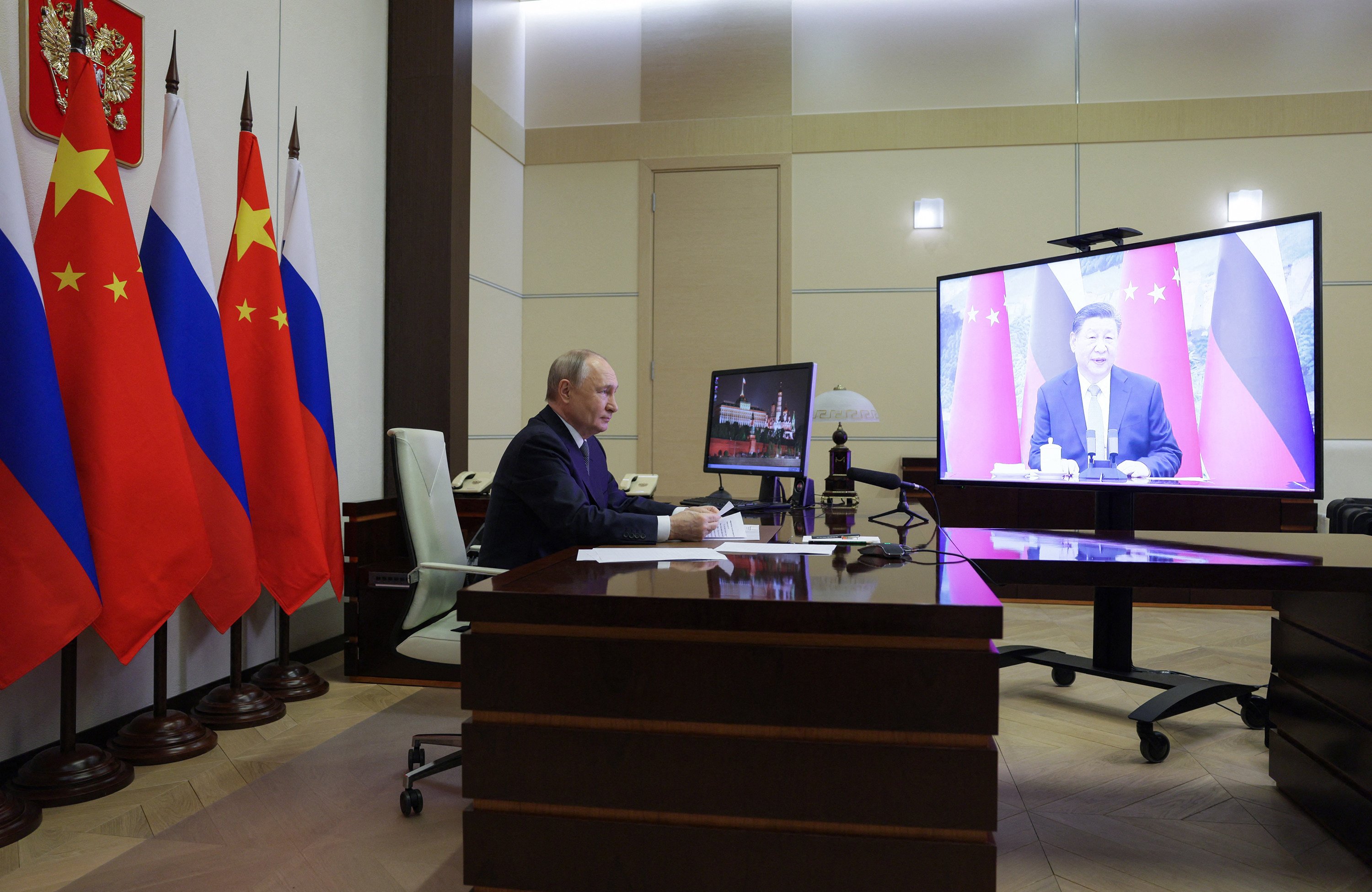 Russian President Vladimir Putin holds a videocall with Chinese President Xi Jinping on Tuesday. Photo: AFP/Getty Images/TNS