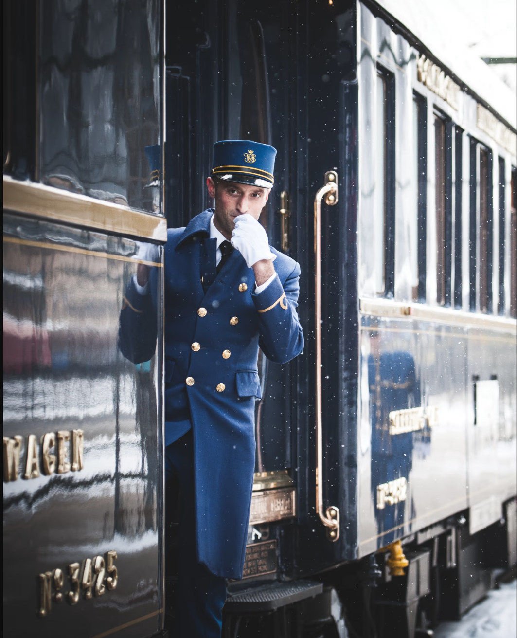 A guard blows the whistle as a Belmond Venice Simplon-Orient-Express train from Paris to Venice departs. Photo: Belmond Venice Simplon-Orient-Express