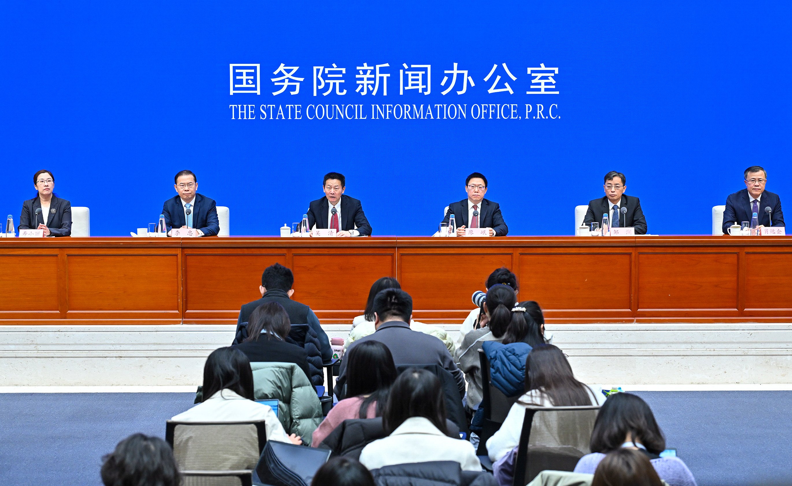 Wu Qing, chairman of the China Securities Regulatory Commission (third from left) announces new measures to stabilise China’s stock market in Beijing on January 23, 2025. Photo: Xinhua